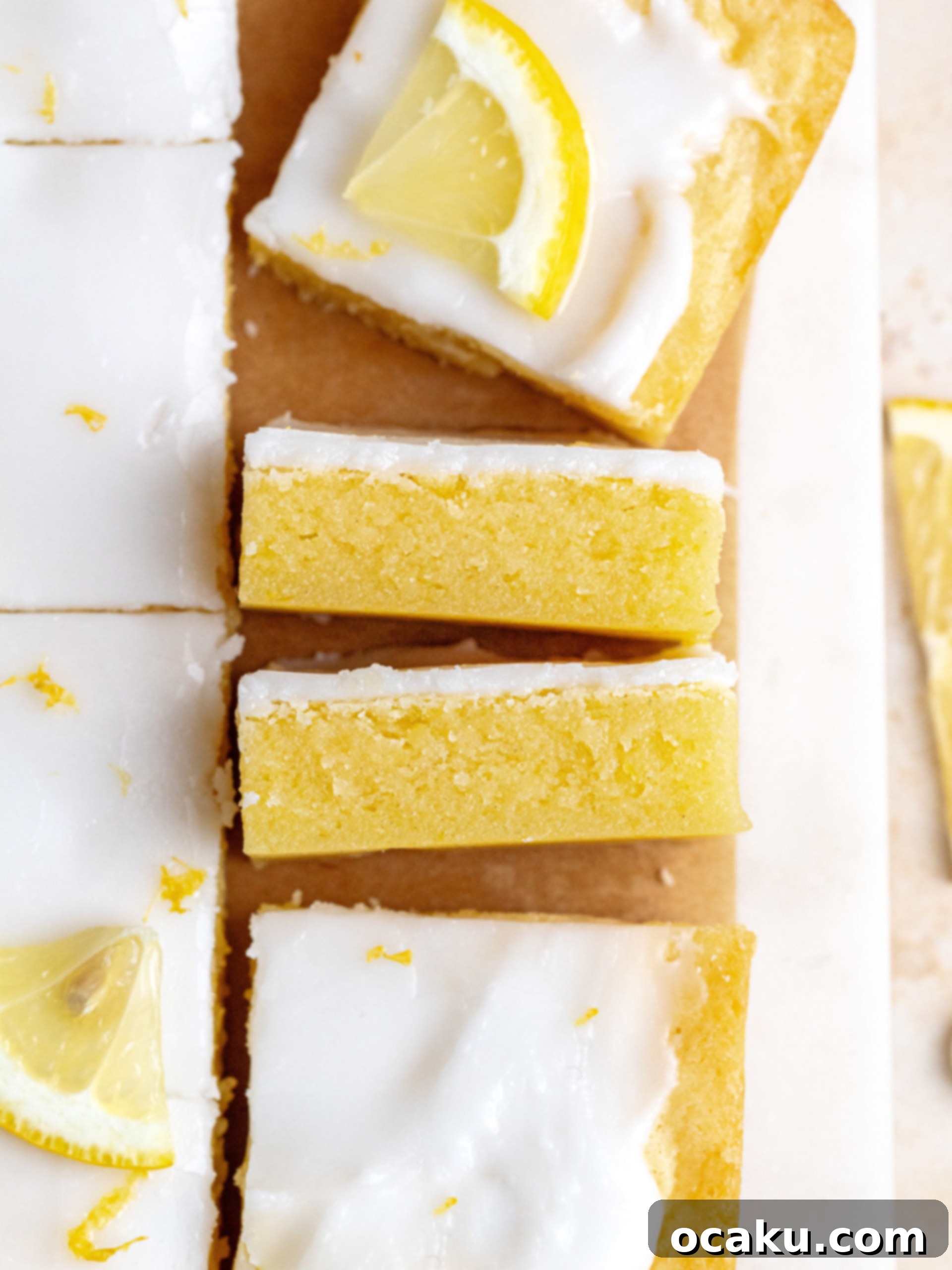 Fudgy lemon brownies made with white chocolate, dusted with powdered sugar