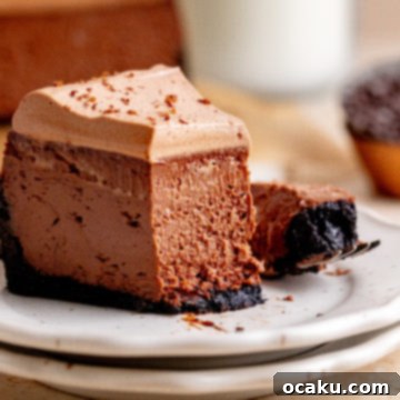 Decadent Chocolate Cheesecake 14 A delicious slice of Chocolate Cheesecake with rich ganache topping.