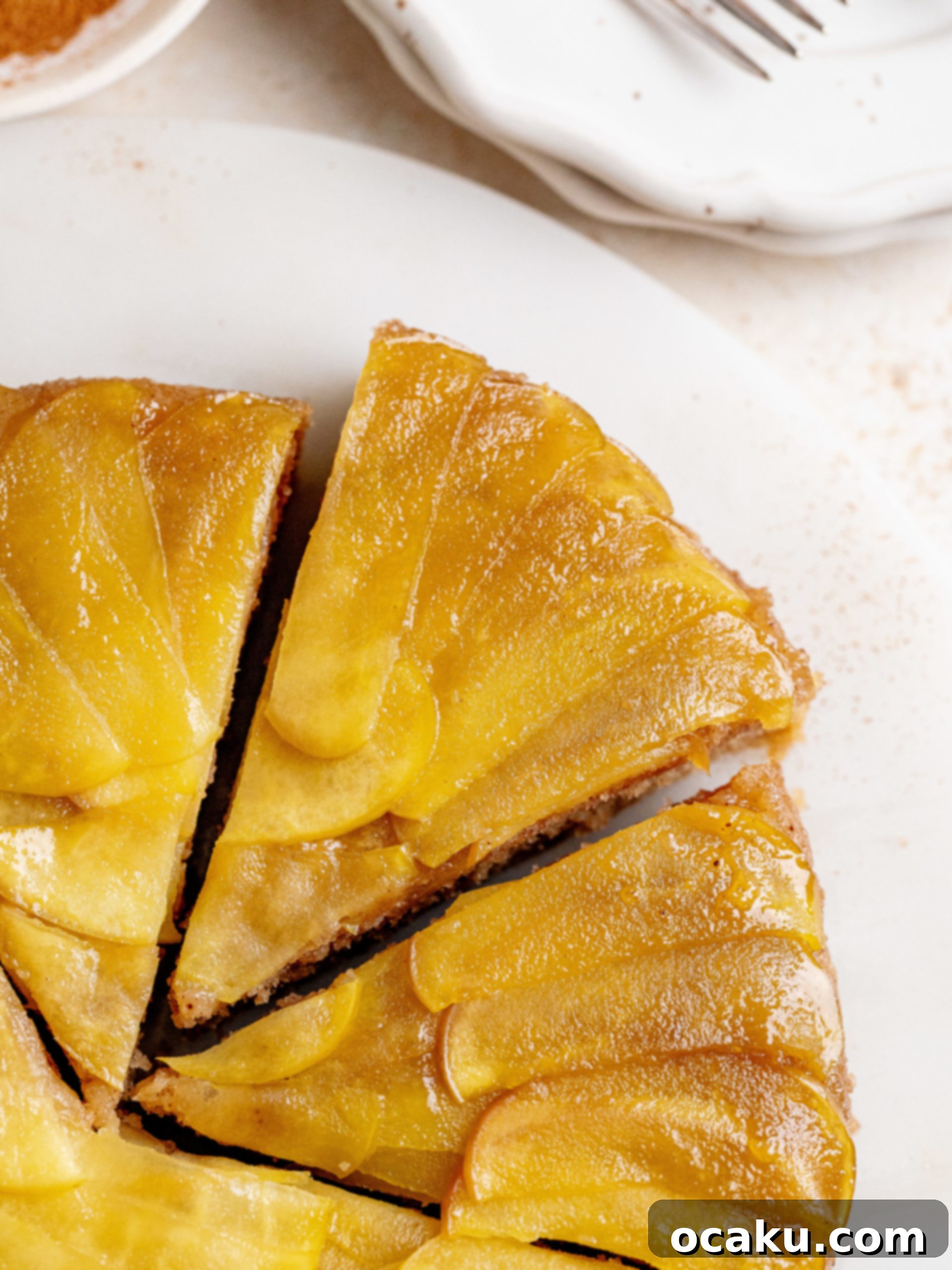 Maple Apple Upside Down Cake with sliced apples on top