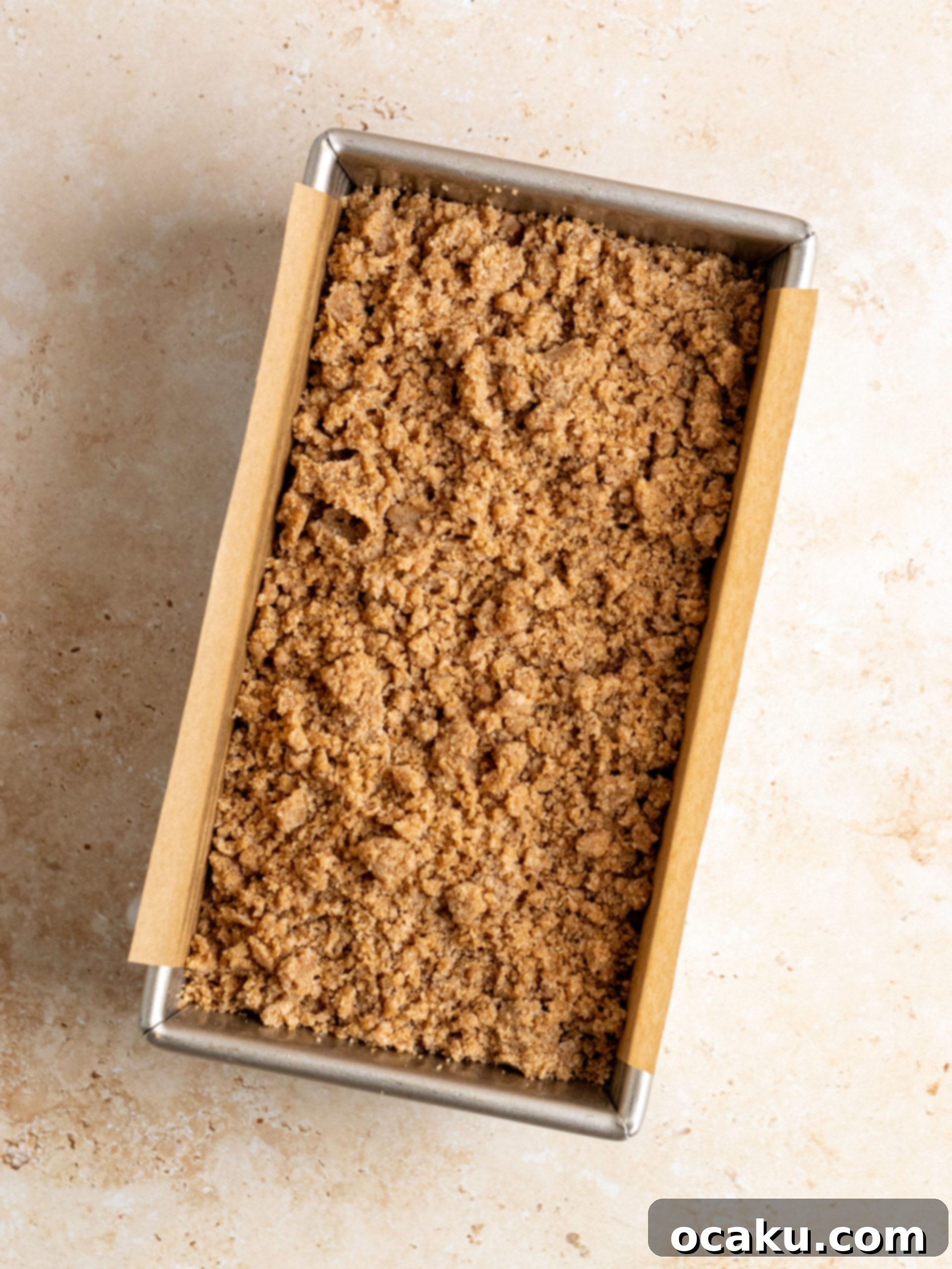 Pumpkin Perfection Loaf with Crumbly Topping and Spice Drizzle 5 Mixing wet ingredients in a separate bowl for pumpkin bread.