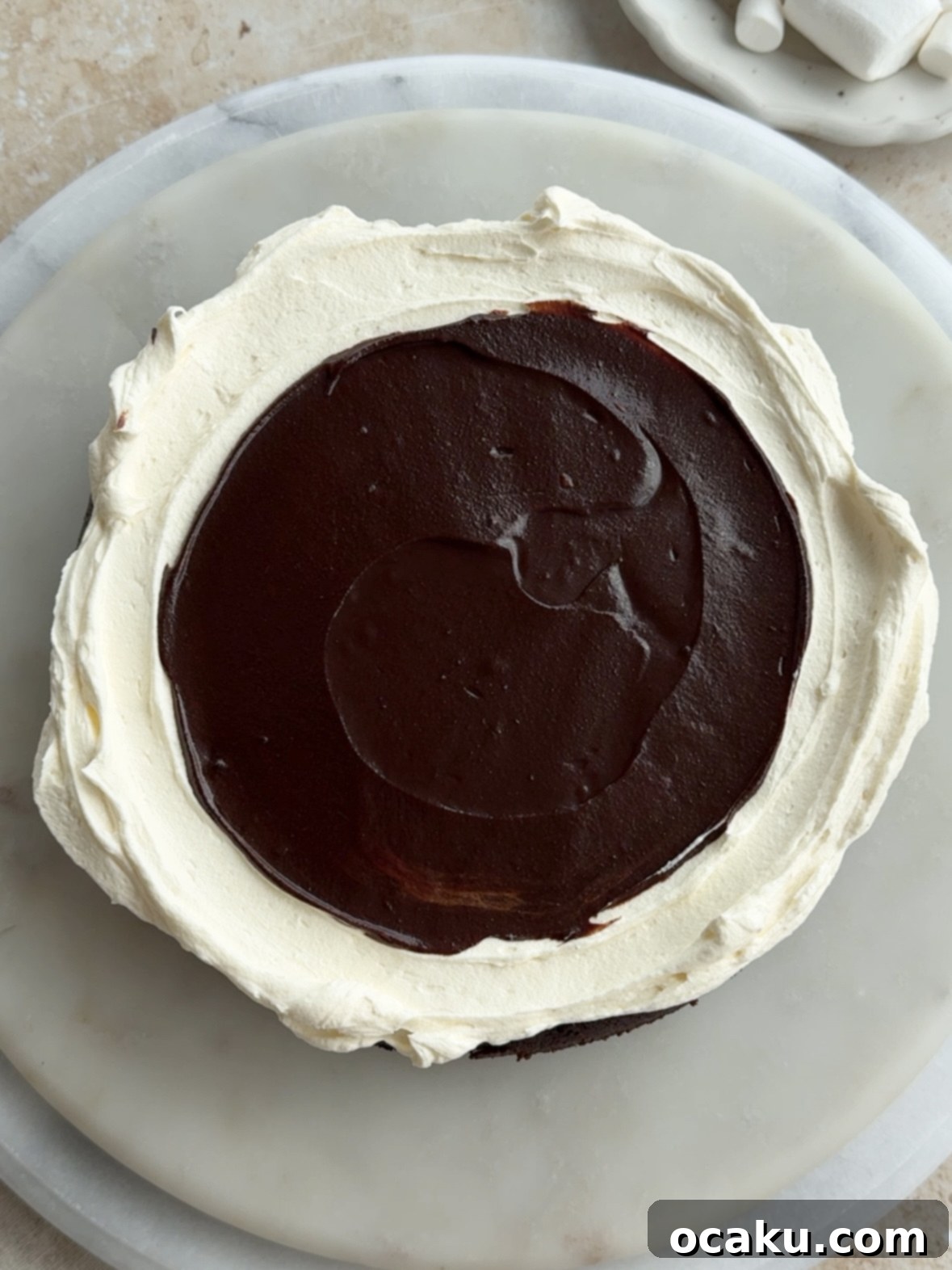 Creamy, whipped butter ready for powdered sugar in the marshmallow buttercream.