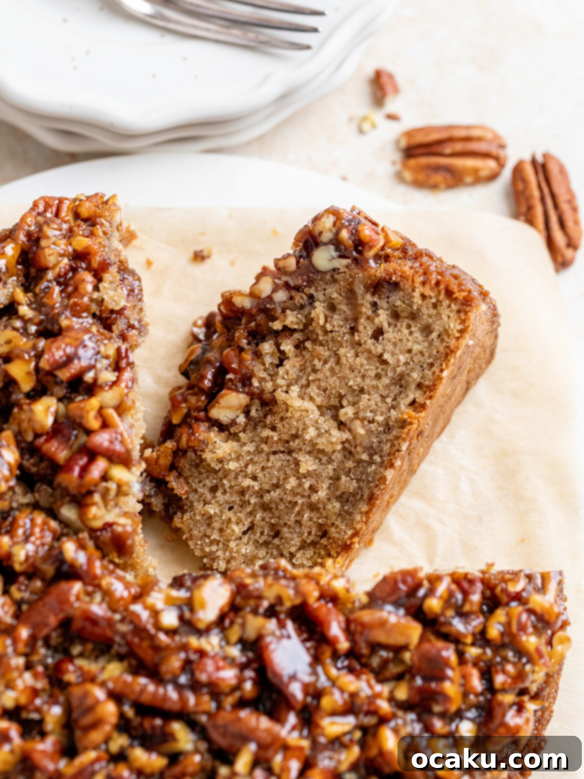 Pecan Pie Upside Down Cake on a cooling rack