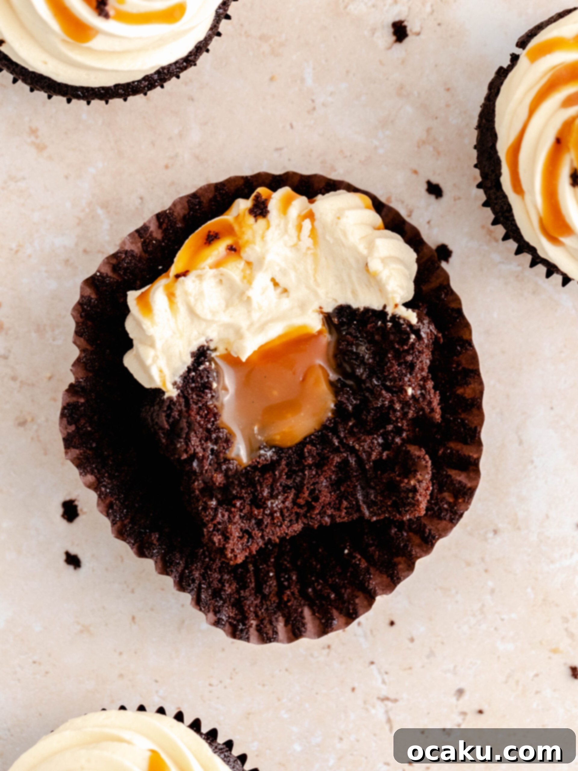 A close-up shot of a single caramel filled cupcake, showing its intricate details and delicious topping.