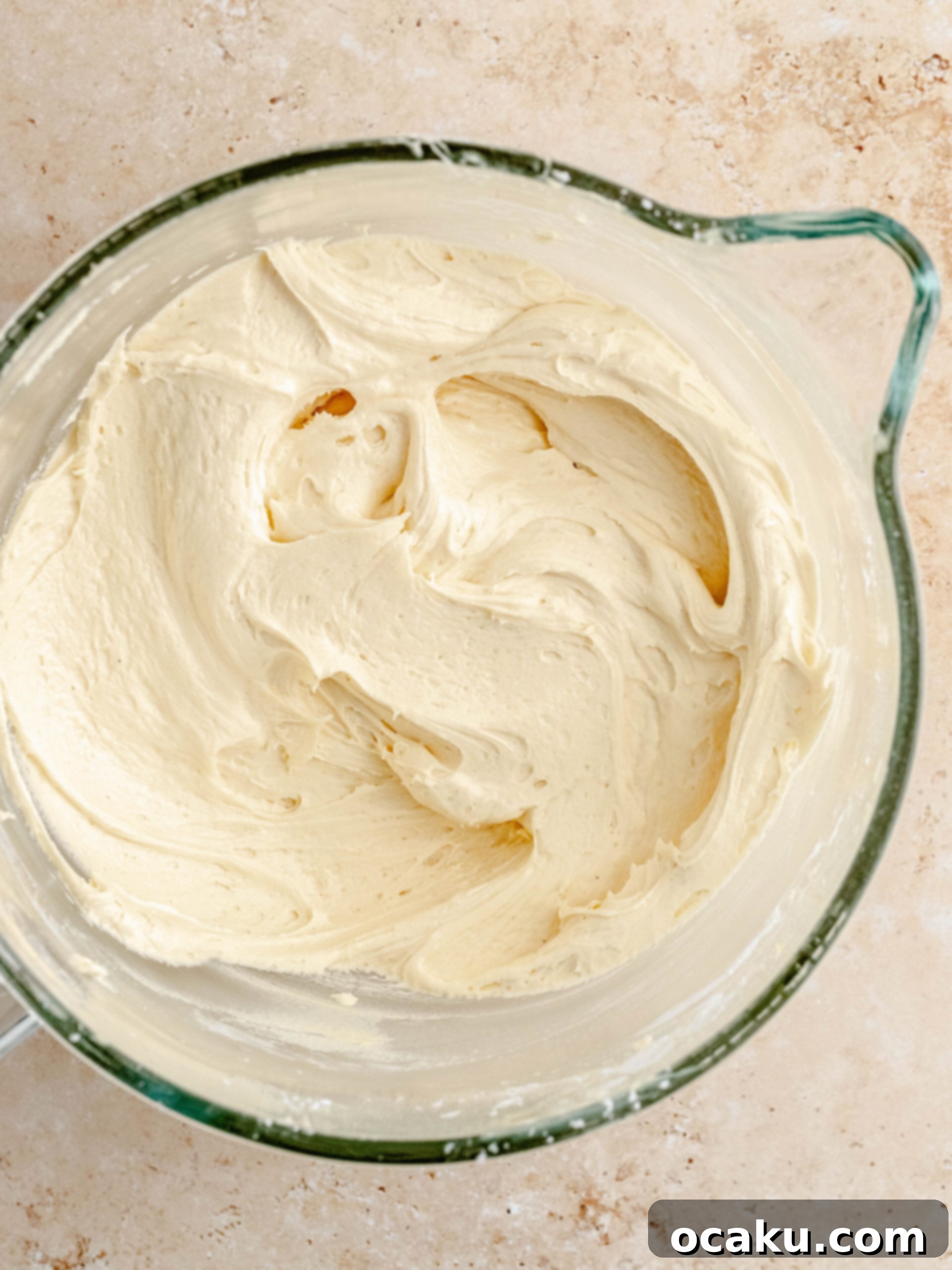 Adding heavy cream to melted sugar for caramel