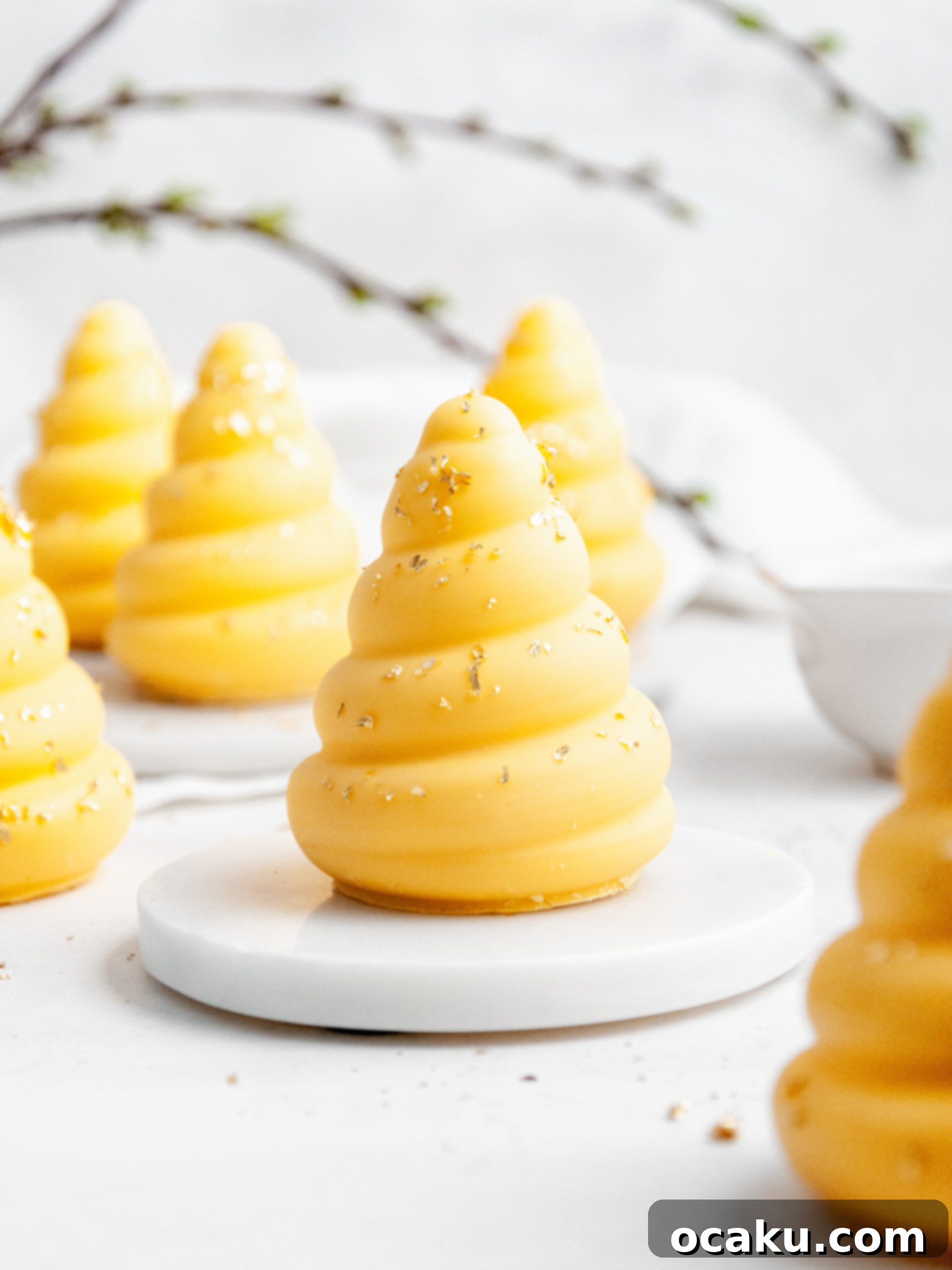 A tray of beautifully crafted lemon cream puffs, perfect for a sunny day.