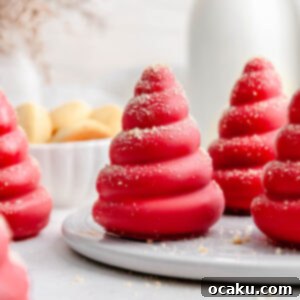 Strawberry Cookie Dream Puffs 5 A vibrant Strawberry and Cookie Cream Puff, ready to be enjoyed.