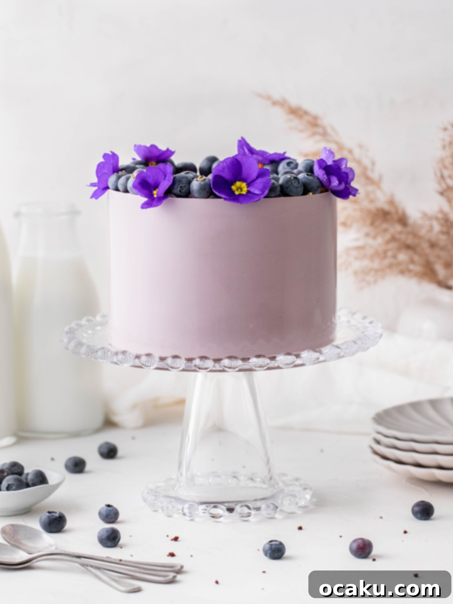 Decadent Chocolate Cake with Blueberry Cream Cheese Swirl 3 Close-up of a slice of Blueberry Cream Cheese Chocolate Cake, showing the distinct layers and luscious purple filling.