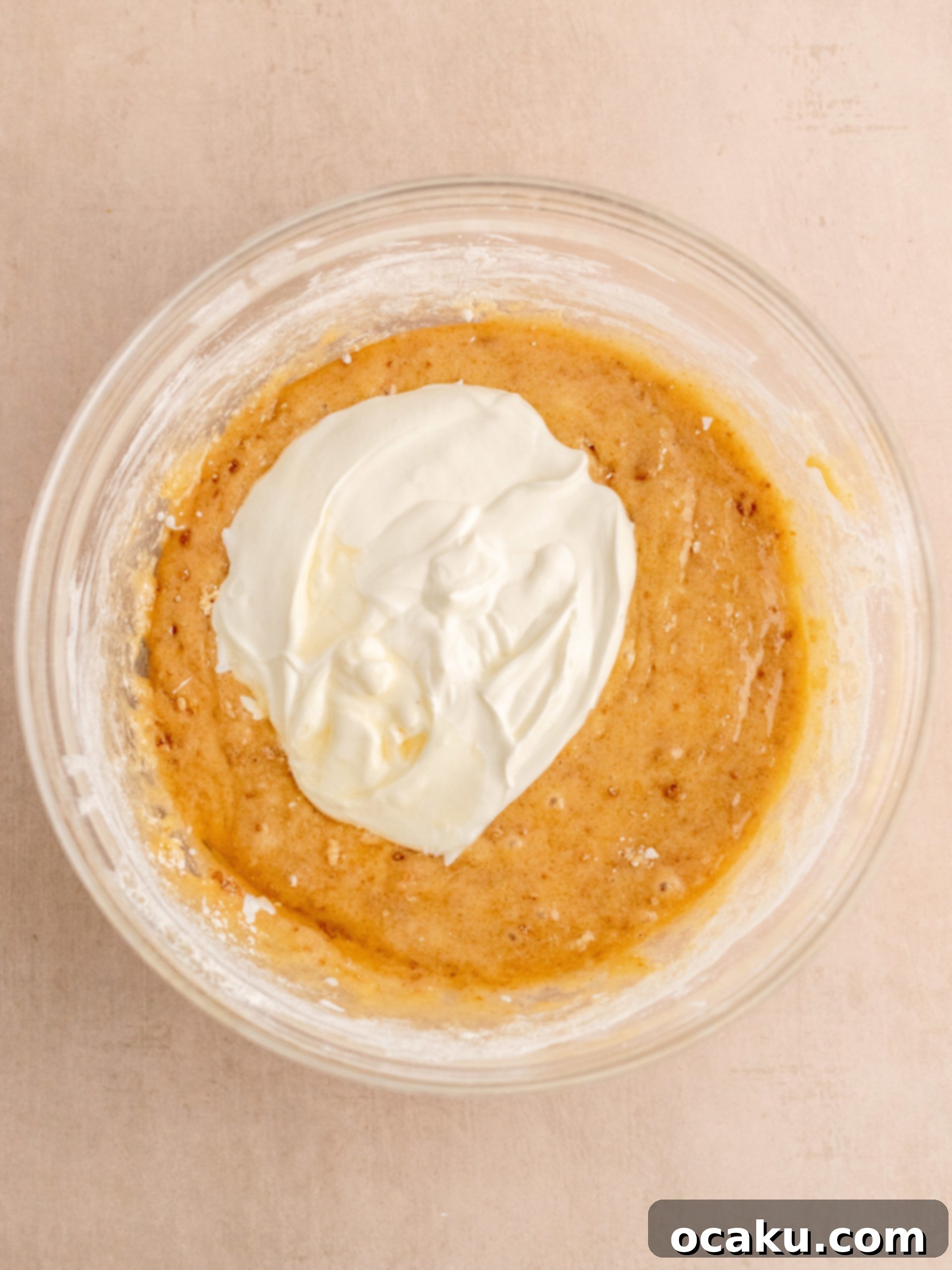 Biscoff Dream Cake 6 Step-by-step image of a baked Biscoff cake cooling on a wire rack.