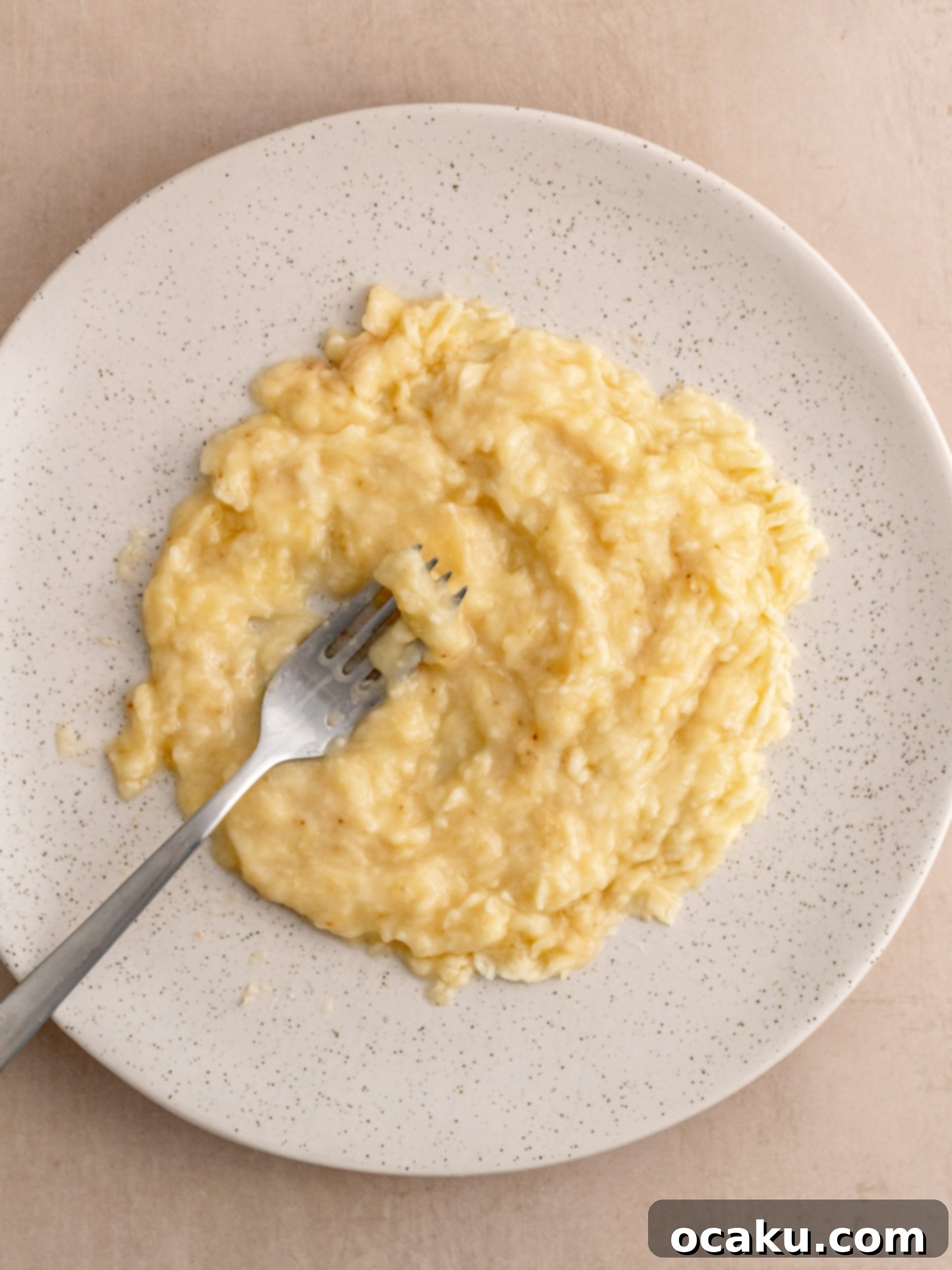 Banana cake batter in baking pan
