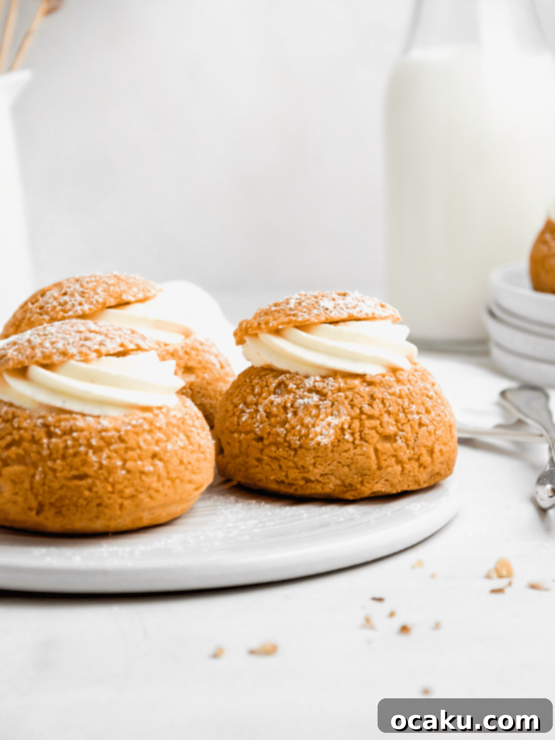 Close-up of baked Choux au Craquelin showing the distinct crispy craquelin topping and golden color