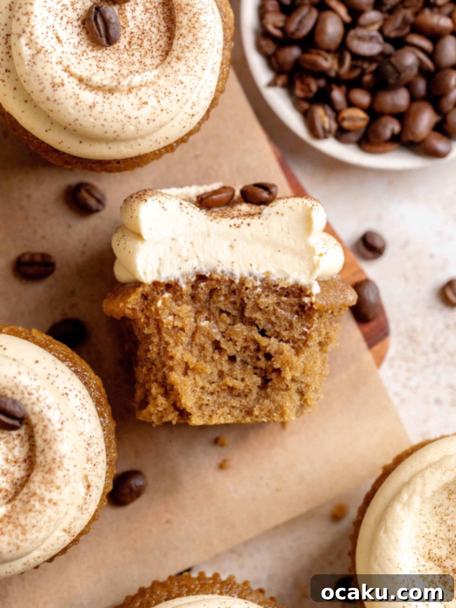 Close-up of a beautifully piped coffee buttercream on a cupcake, showcasing its smooth texture.