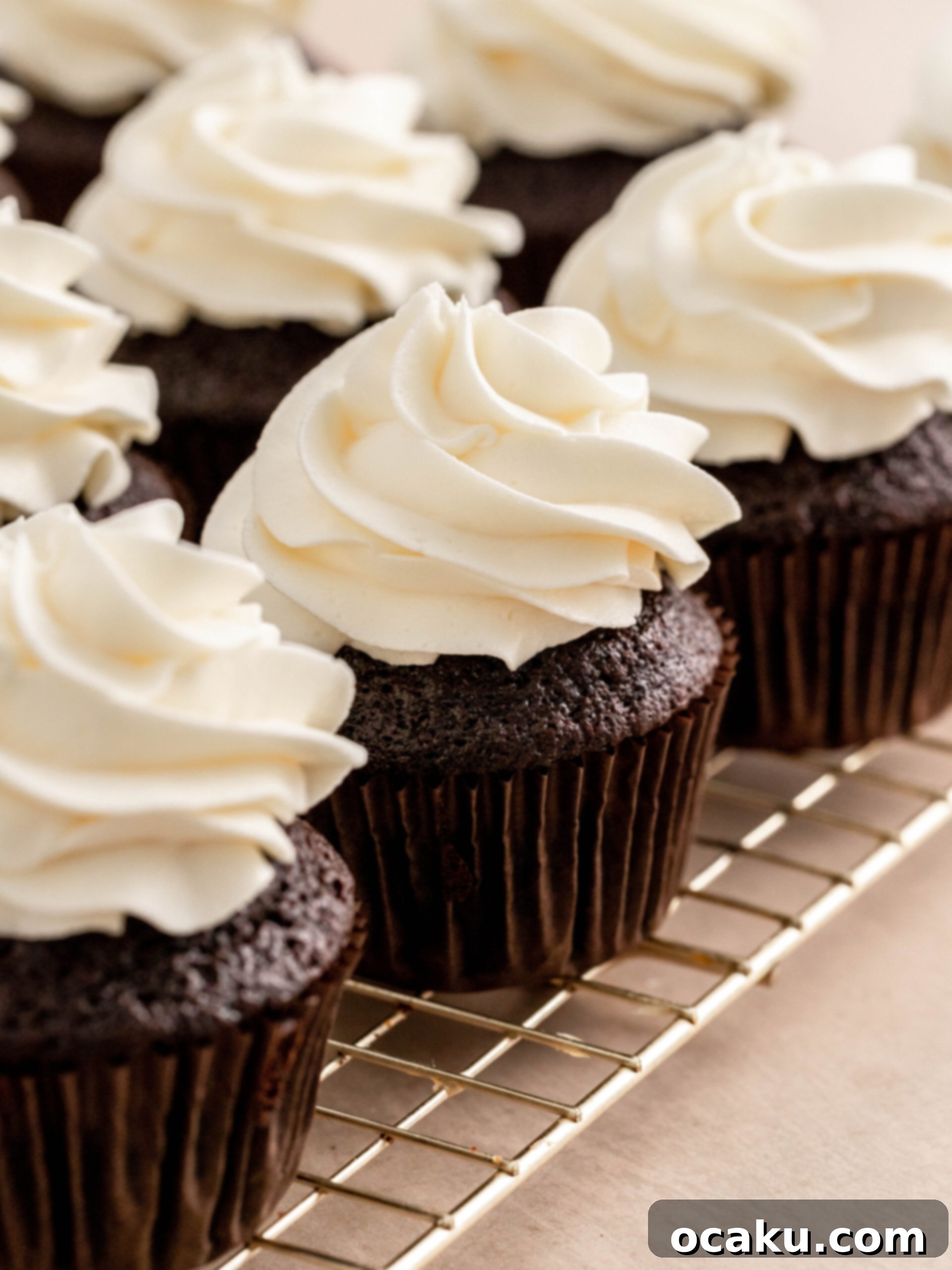 Pipe the buttercream on the cupcakes.