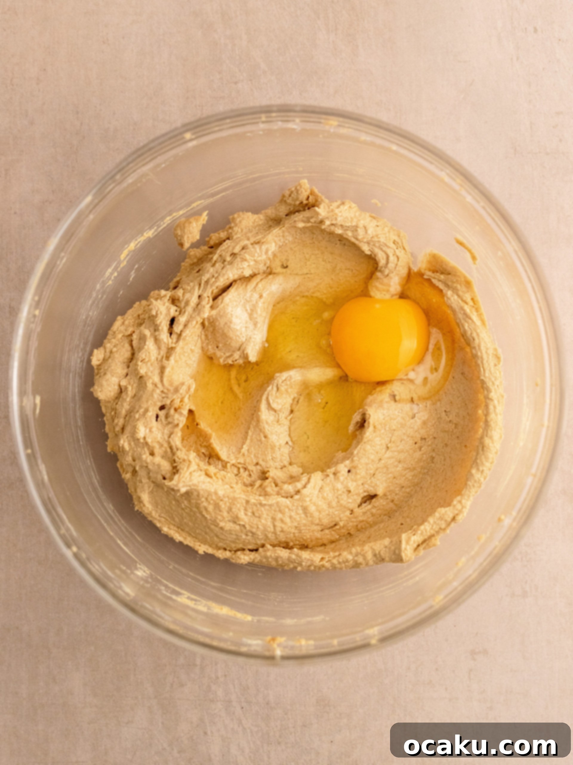 Cookie dough with raspberry swirls before baking.