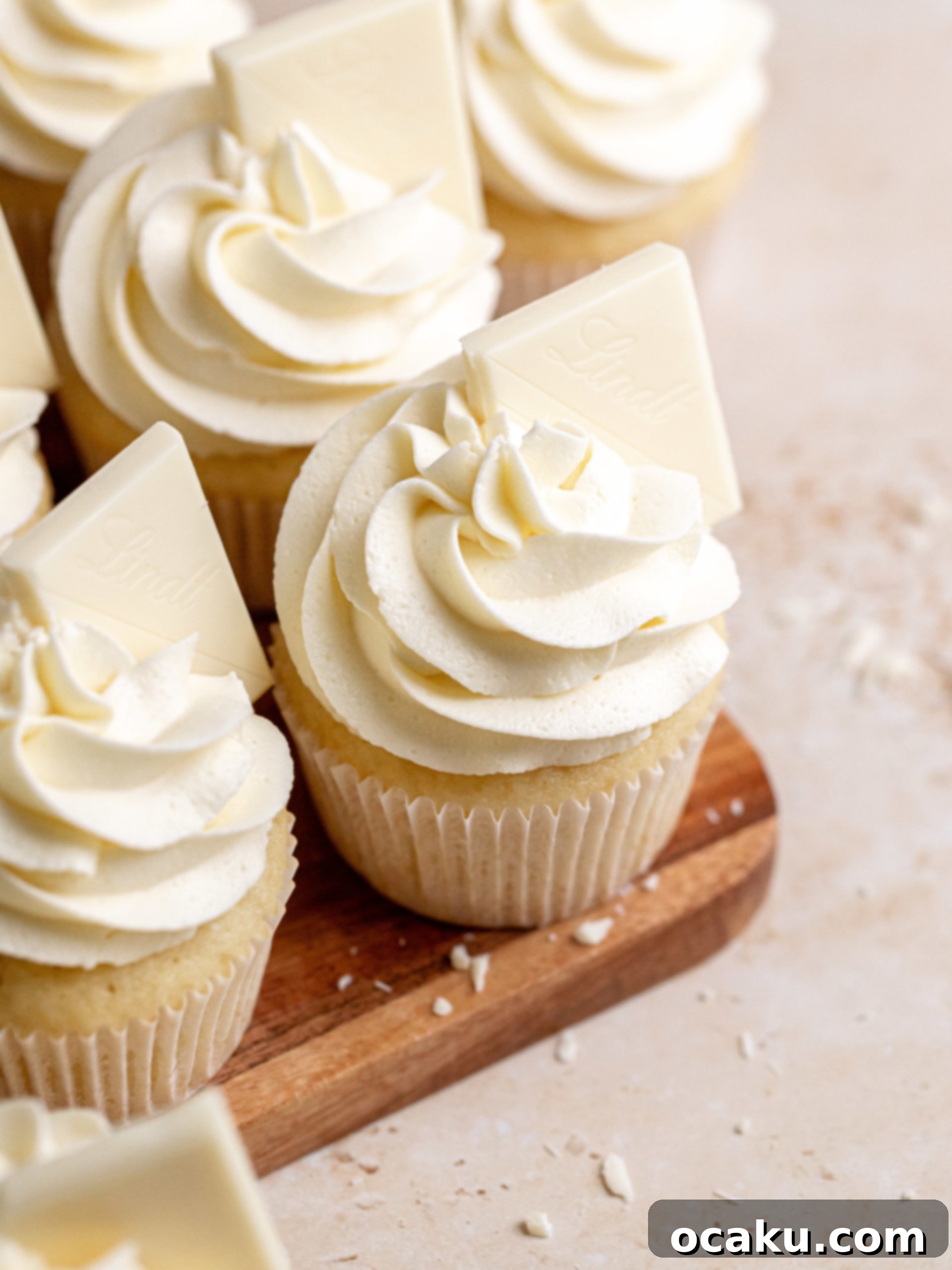 Close-up of a white chocolate cupcake with elegant frosting