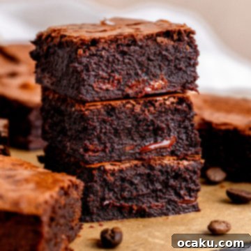 Espresso Brownies, showing a close-up of the fudgy interior and crinkly top.