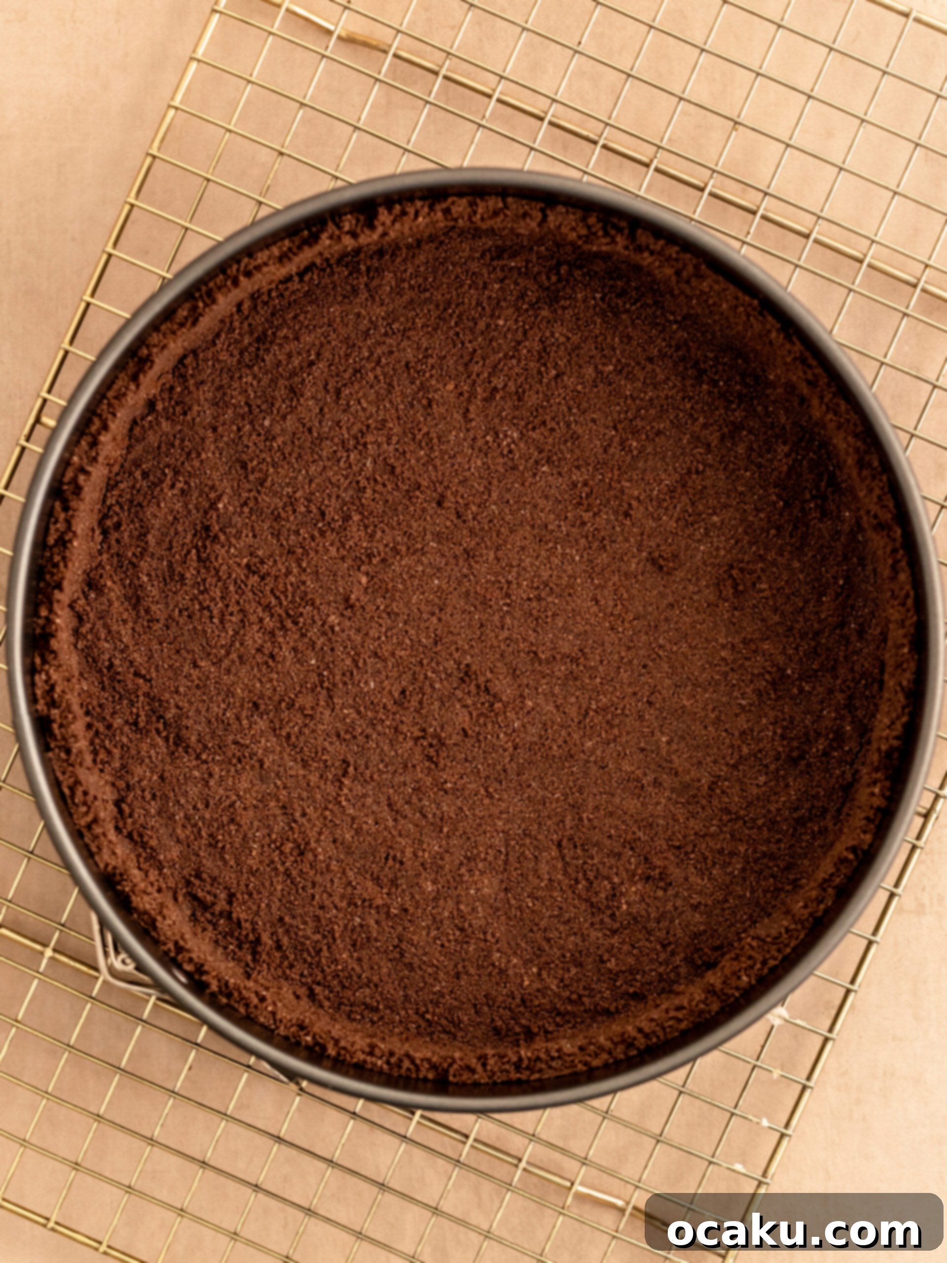 Decadent Chocolate Orange Cheesecake 3 Crushed cookies and butter mixed in a food processor for the crust.