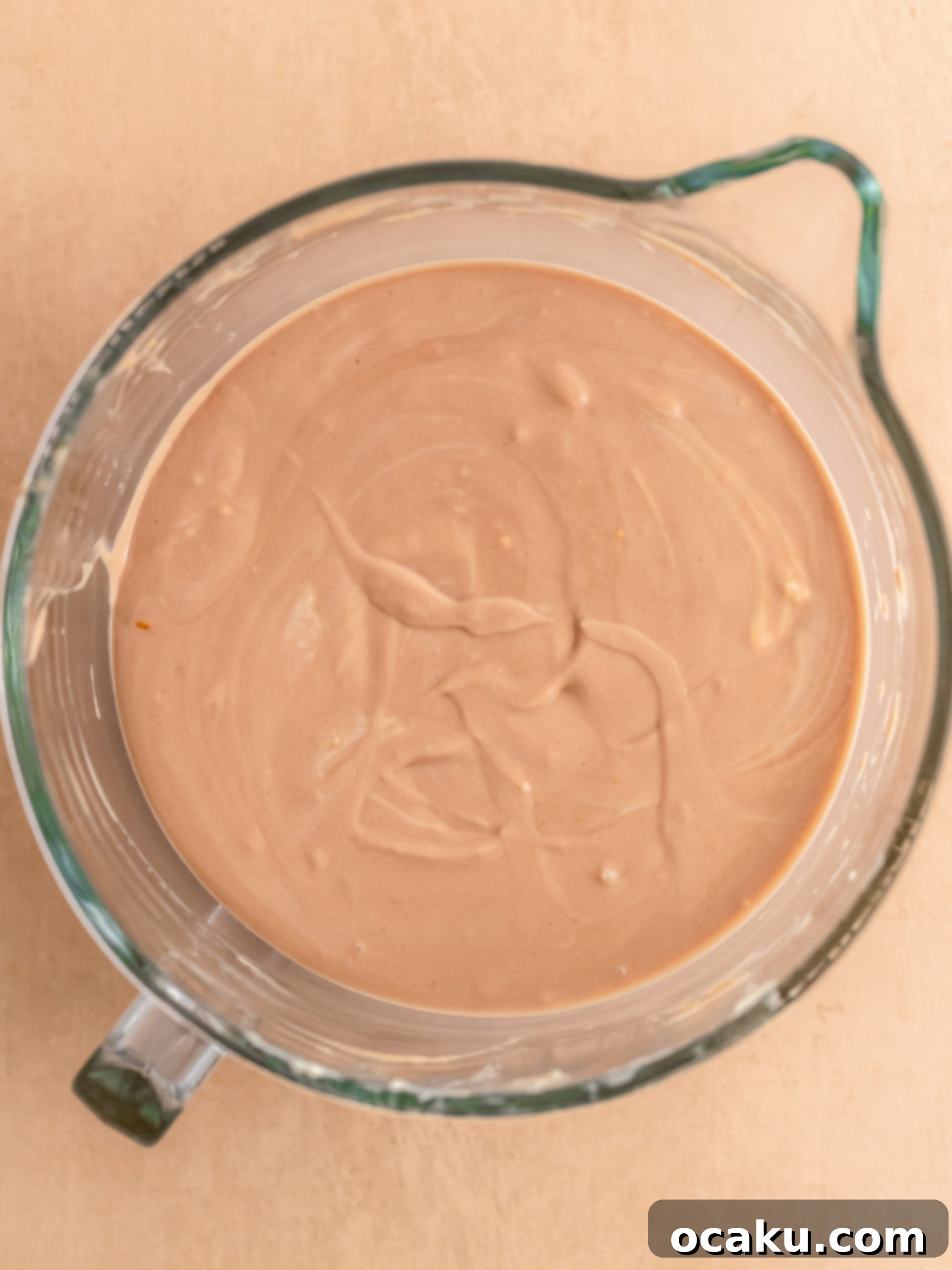 Decadent Chocolate Orange Cheesecake 5 Mixing the creamy cheesecake filling in a stand mixer.