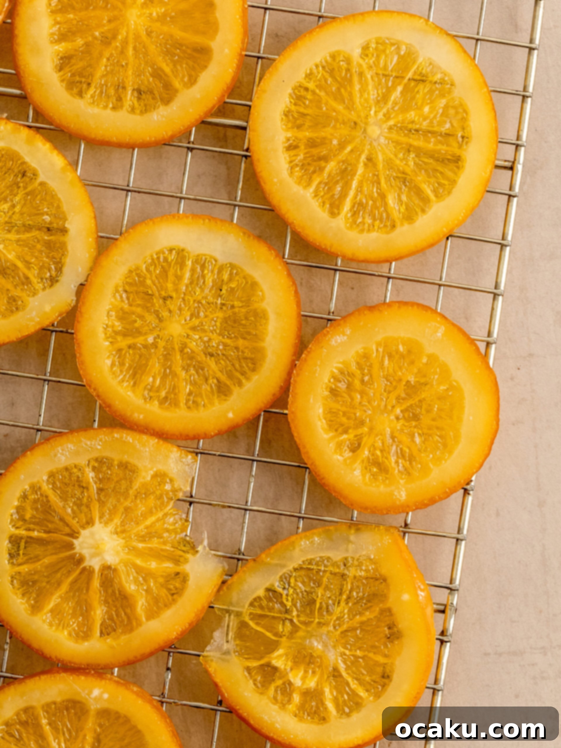 Decadent Chocolate Orange Cheesecake 7 Thinly sliced oranges simmering in sugar syrup.