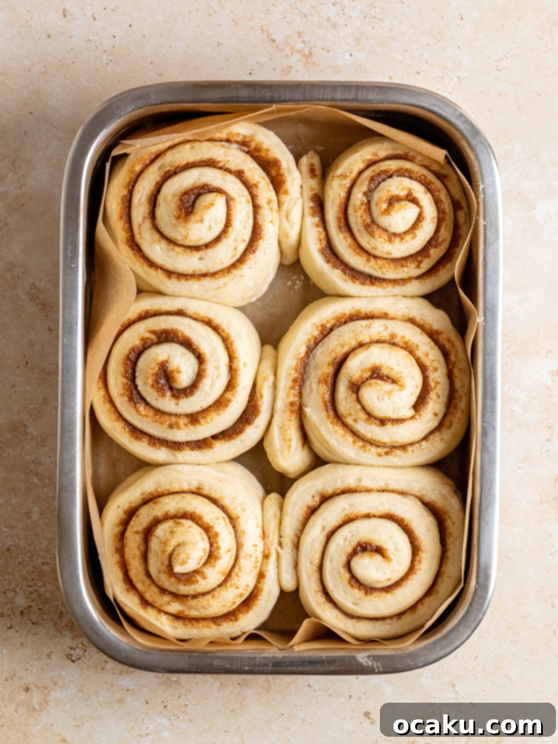 Perfectly Sized Cinnamon Rolls 9 A bowl of creamy, white cream cheese frosting.