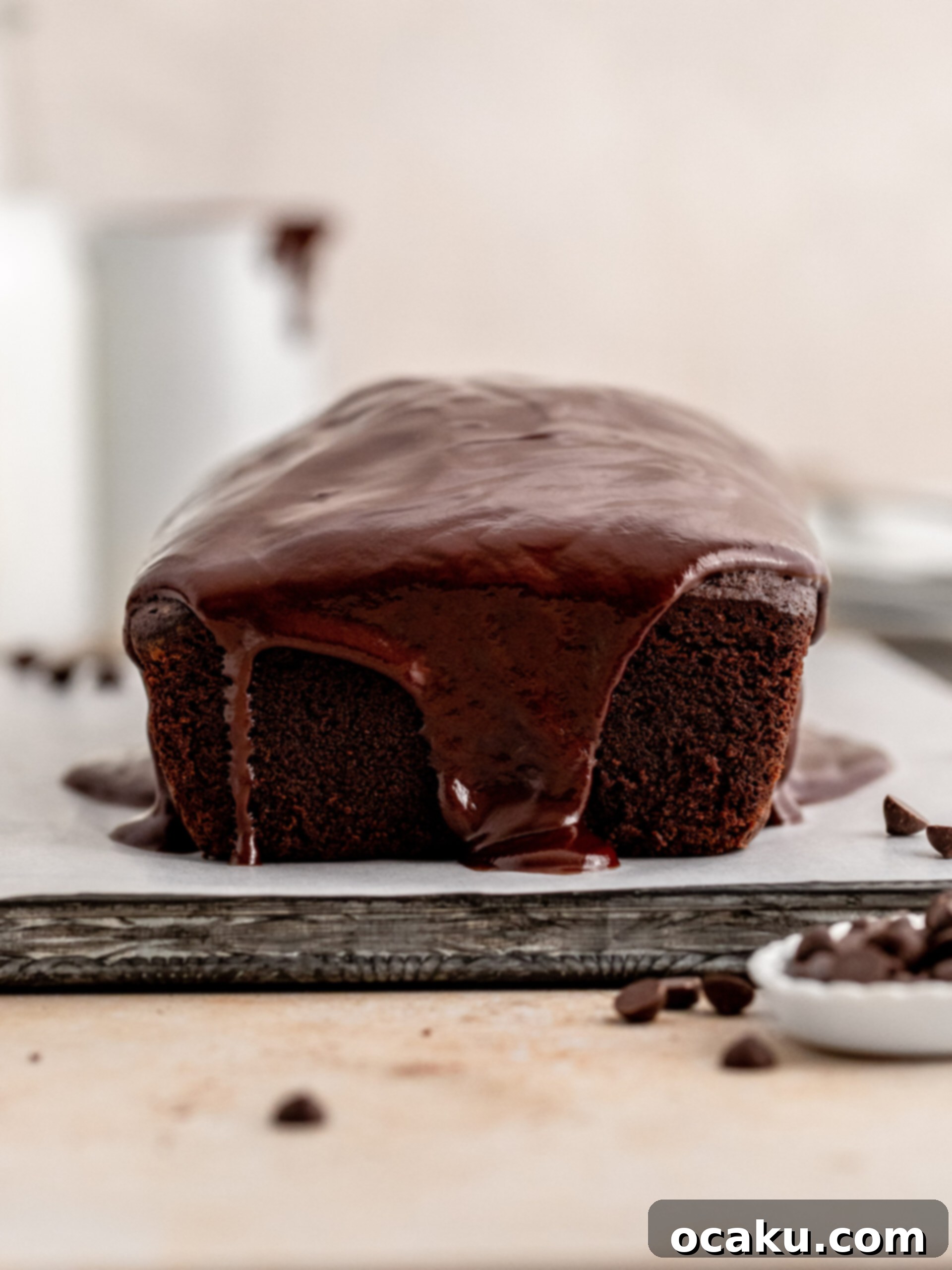 Decadent Chocolate Sour Cream Pound Cake 10 Image of the finished chocolate sour cream pound cake with ganache.