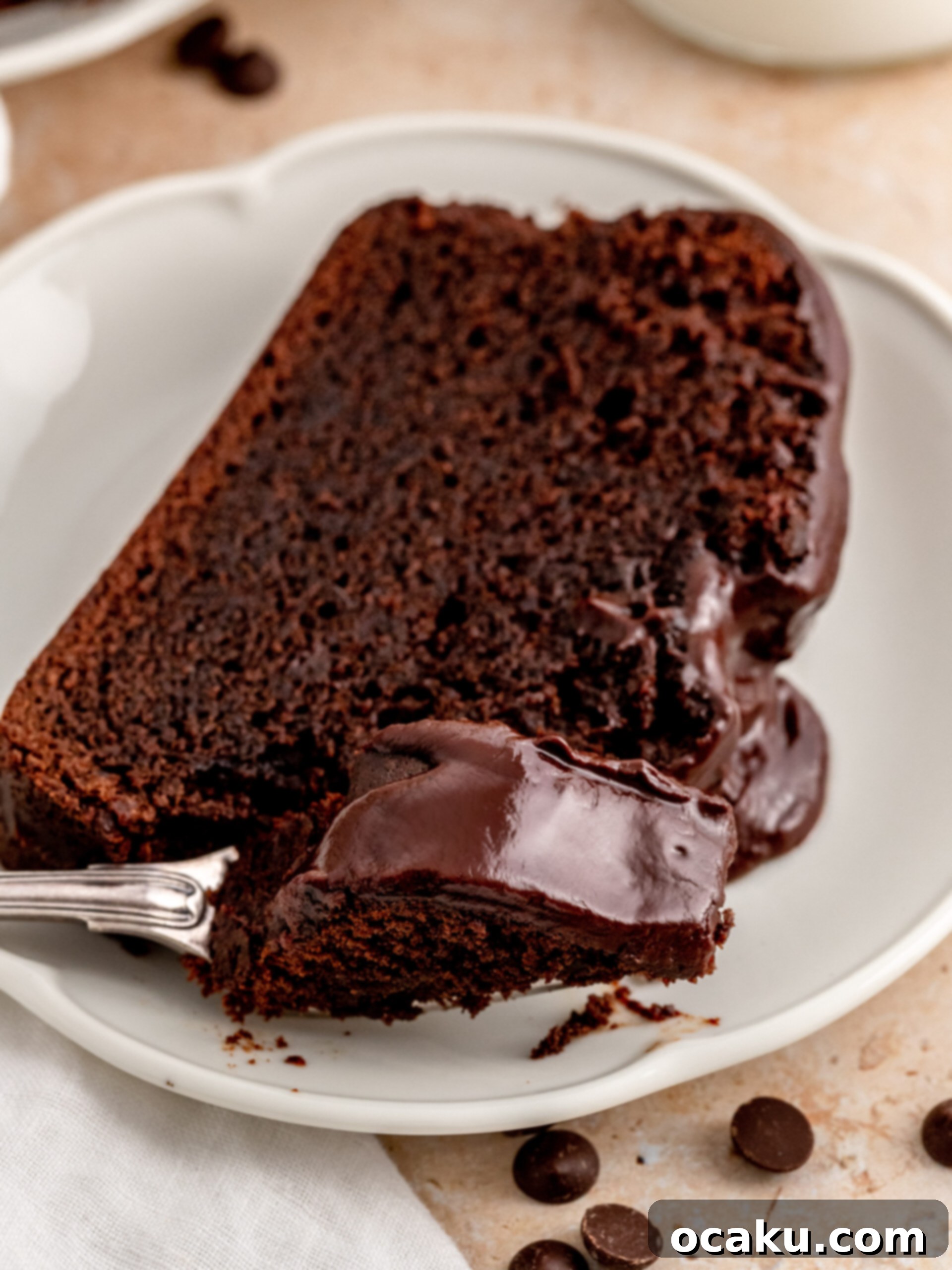 Decadent Chocolate Sour Cream Pound Cake 11 A beautifully sliced chocolate sour cream pound cake revealing its moist texture.