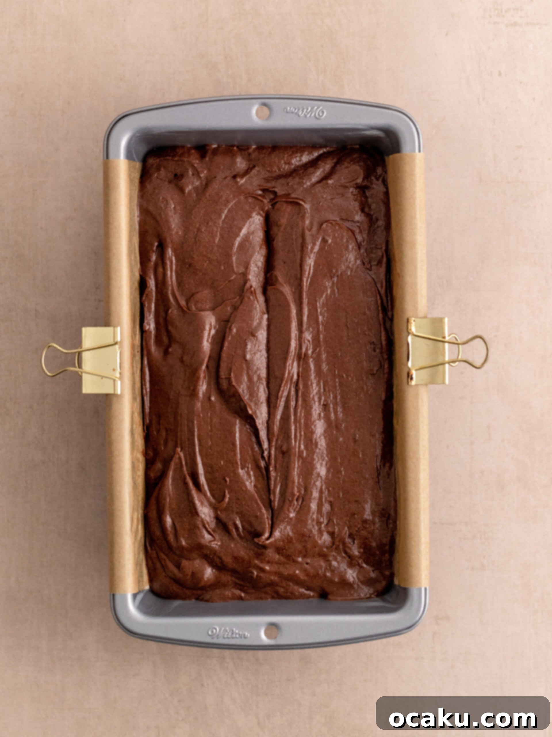 Decadent Chocolate Sour Cream Pound Cake 8 Image of the baked pound cake cooling on a rack.