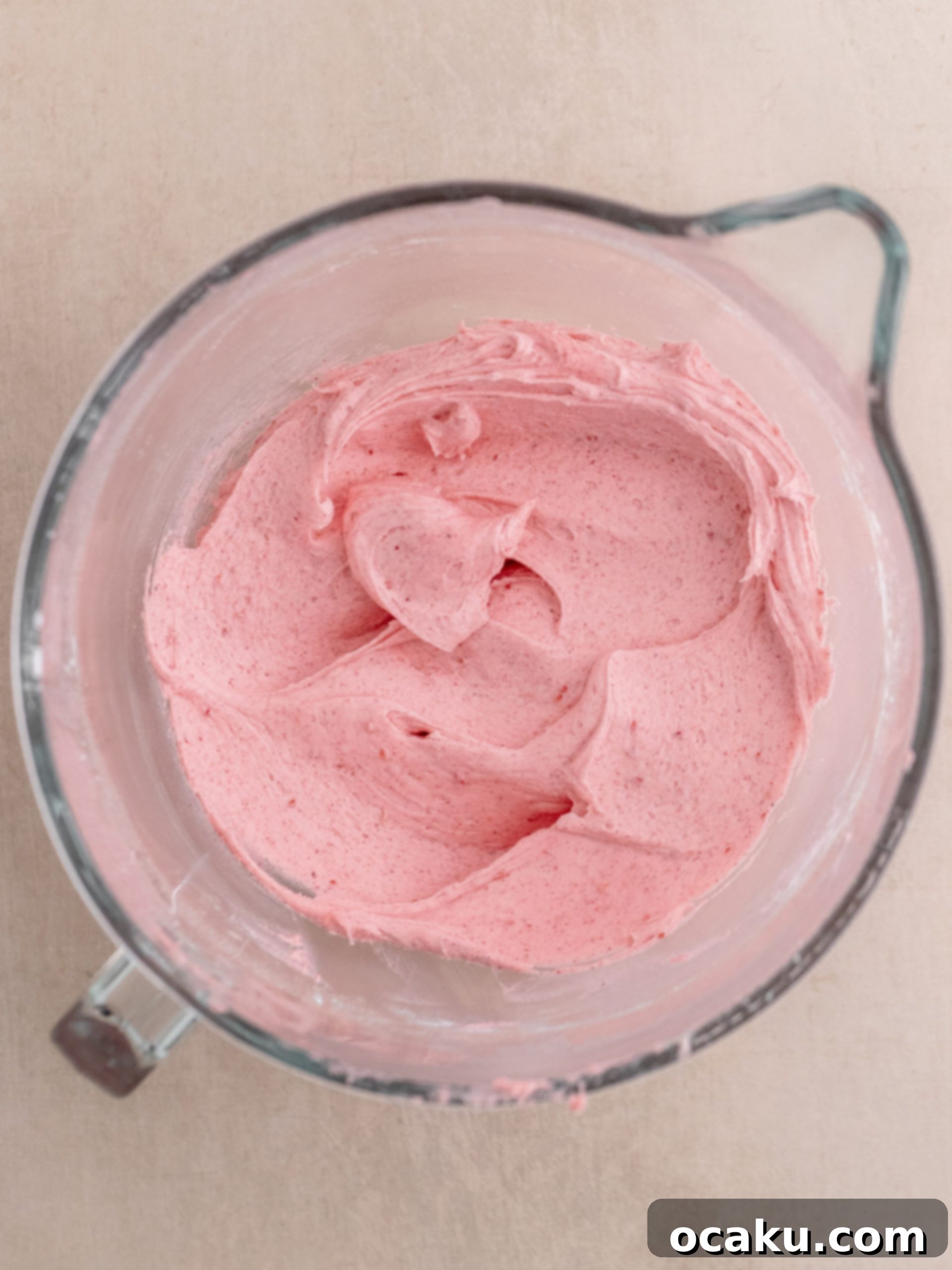 Luscious Raspberry Cupcakes 11 Cupcakes being cored to make space for the jam filling.