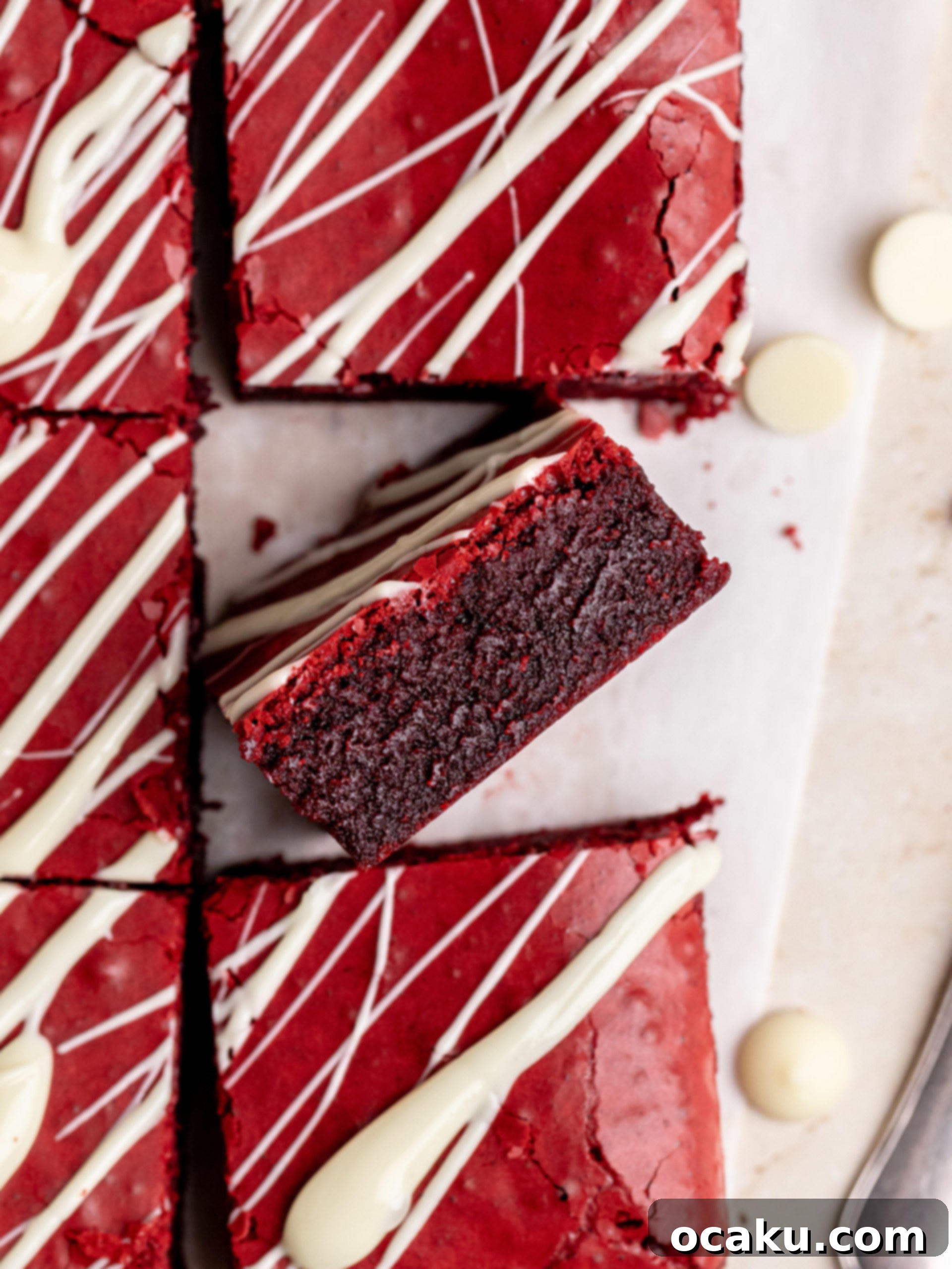 Decadent Red Velvet Brownies 2 Super gooey and fudgy Red Velvet Brownies with white chocolate drizzle, perfect for Valentine's Day