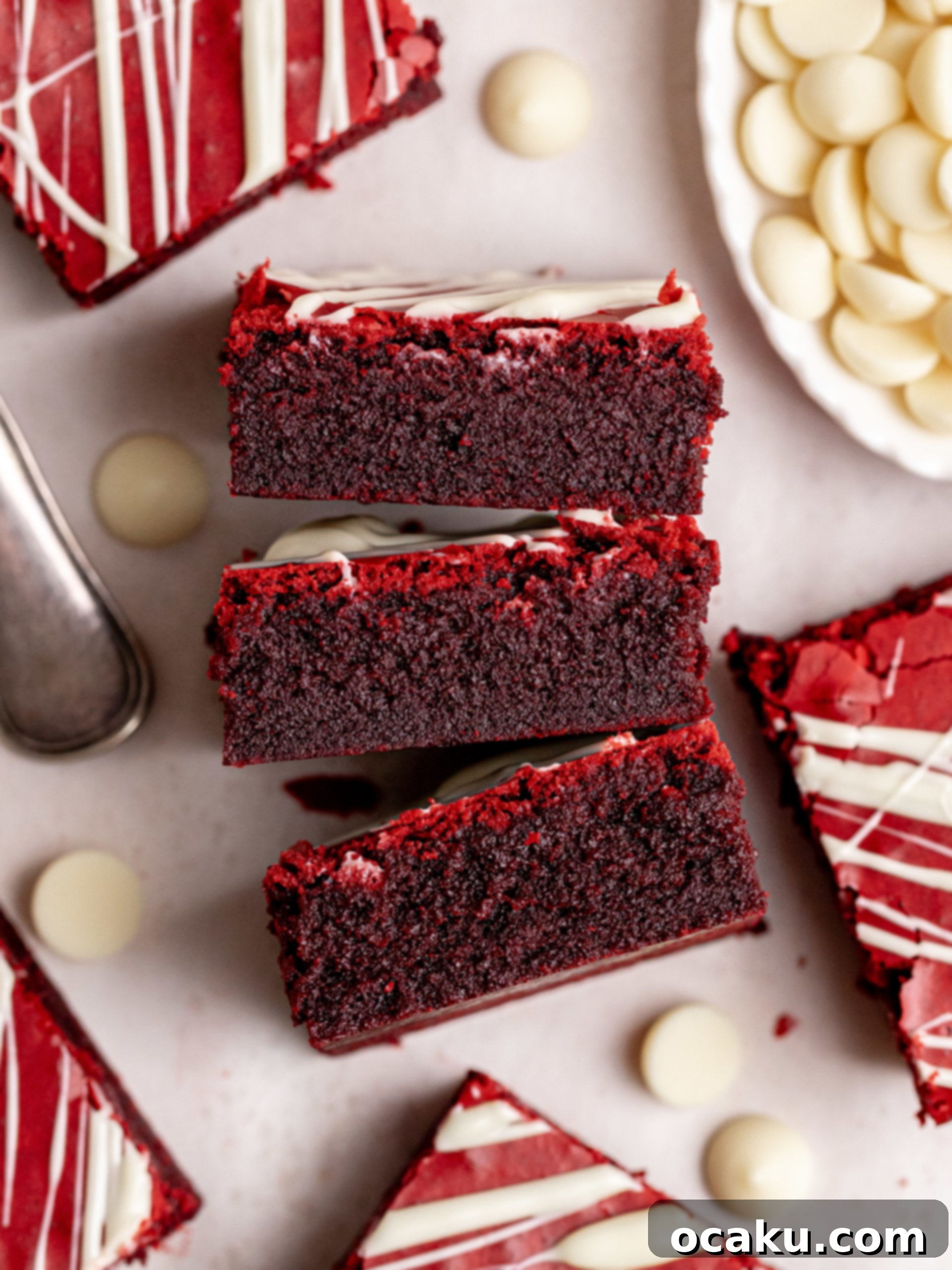 Decadent Red Velvet Brownies 7 Expertly sliced Red Velvet Brownies on a serving board