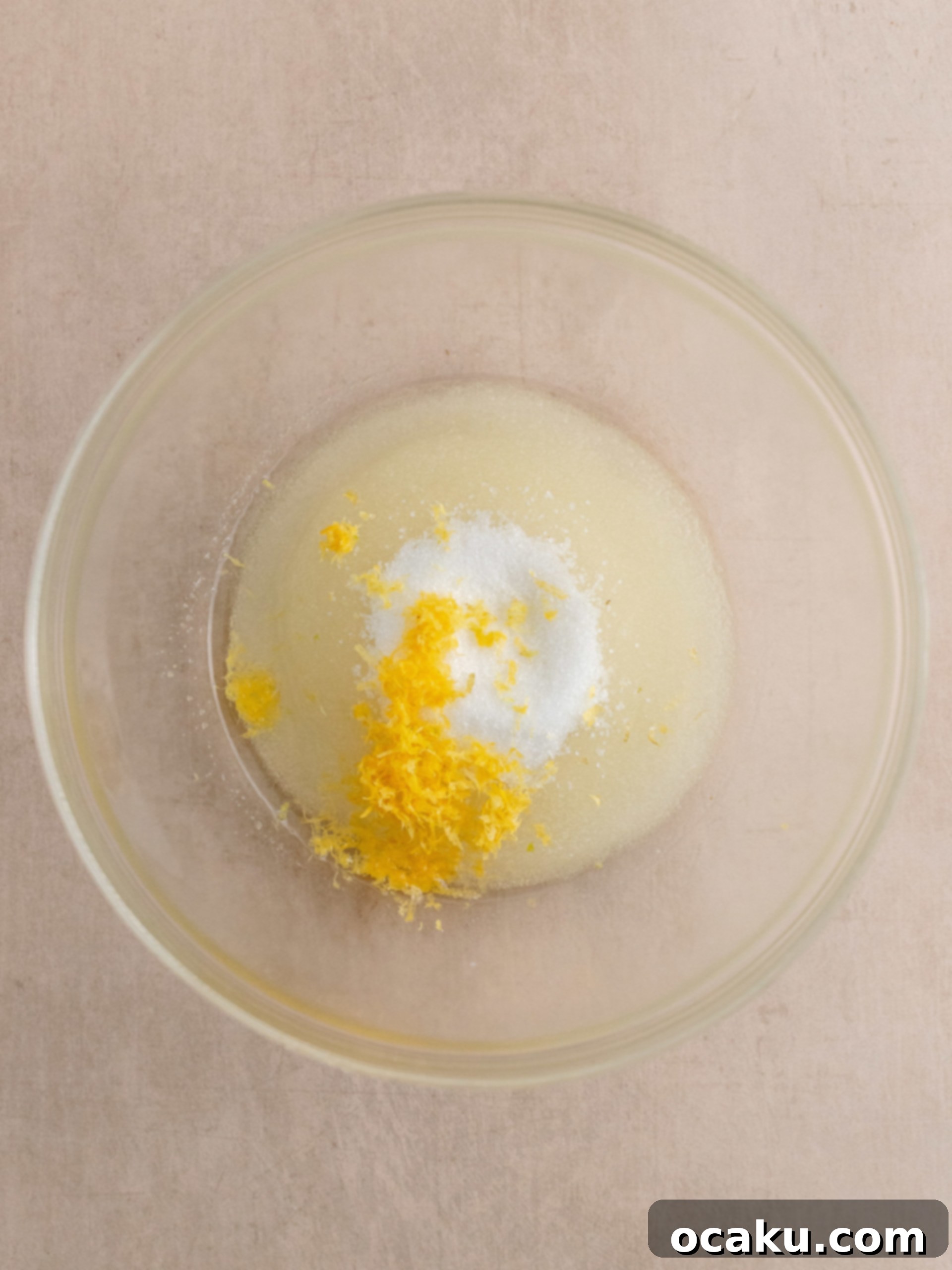 Zesty Lemon Poppy Seed Delights 3 Mixing dry ingredients for lemon poppy seed cupcakes