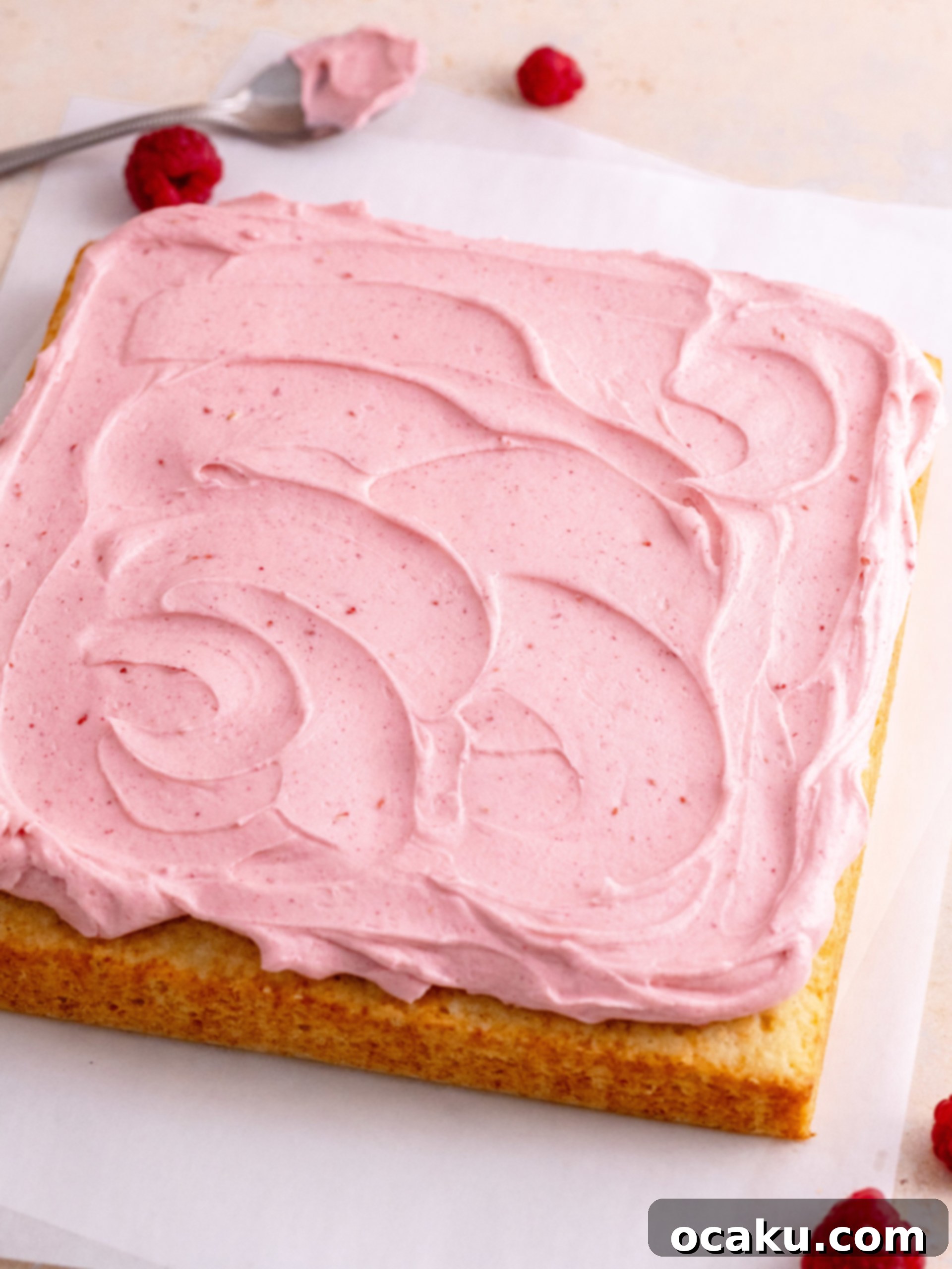 Delicious Almond Raspberry Cake 2 Super soft and delicious Almond Raspberry Cake with fluffy almond cake and raspberry buttercream.