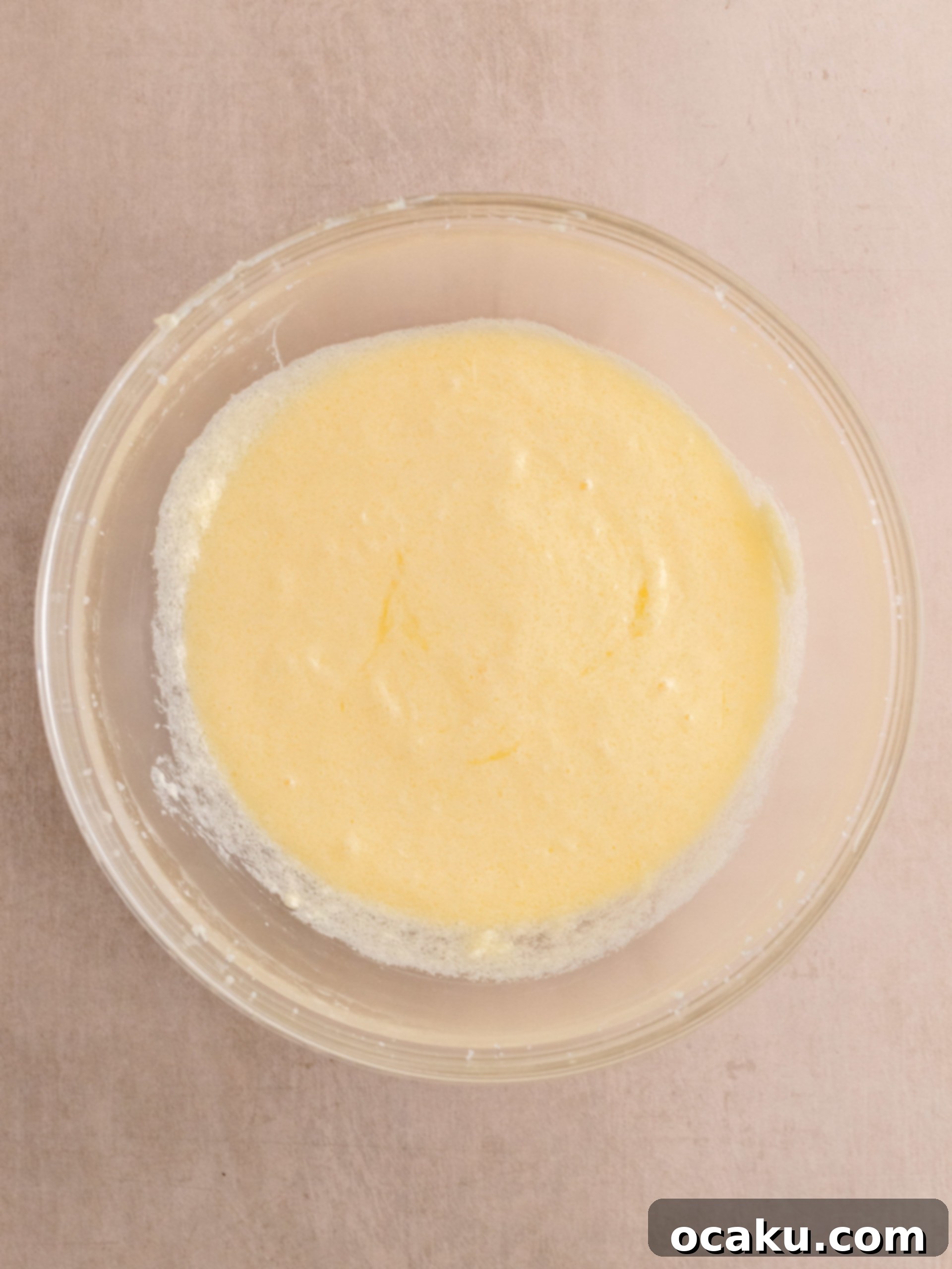 Delicious Almond Raspberry Cake 4 Adding dry ingredients to wet for Almond Raspberry Cake