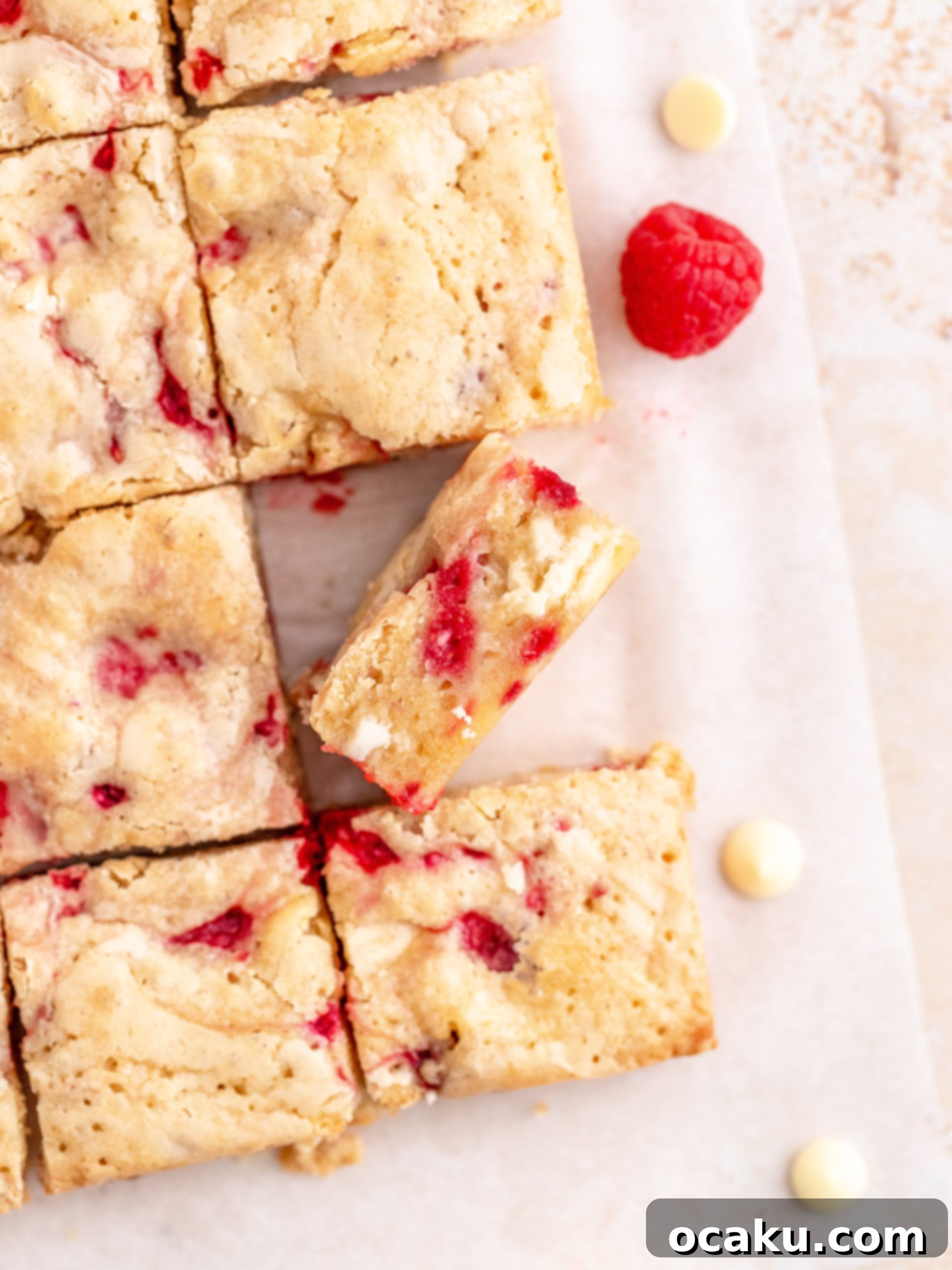 Freshly baked blondies with raspberries and white chocolate