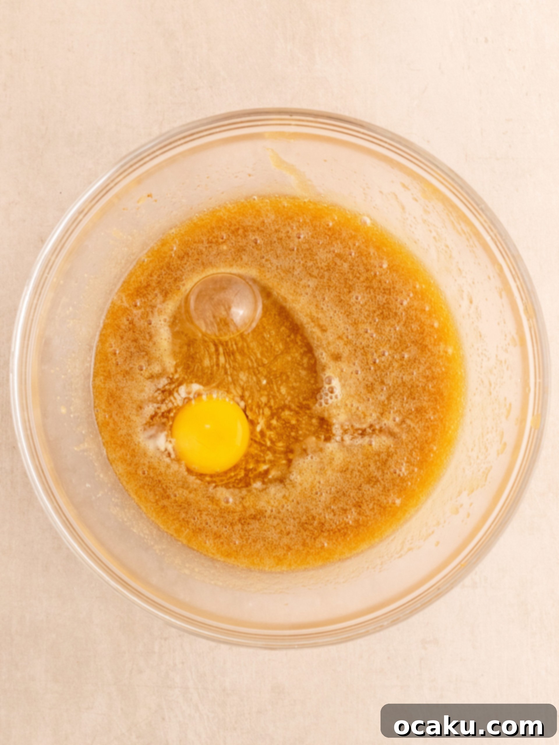 Step-by-step image of mixing sugars and butter