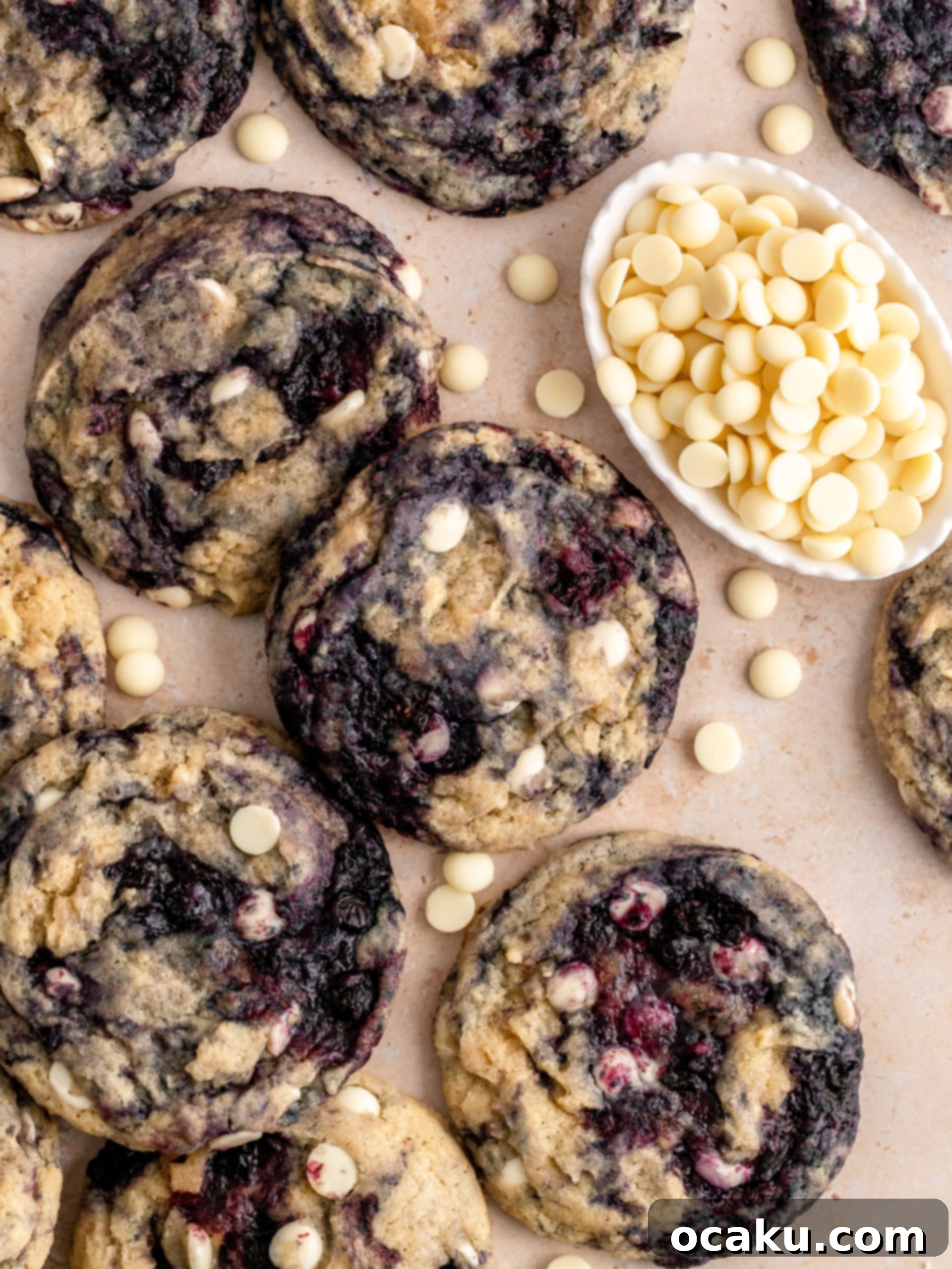 A close-up of a perfectly baked Lemon Blueberry Cookie, showing its soft center and crispy edges.