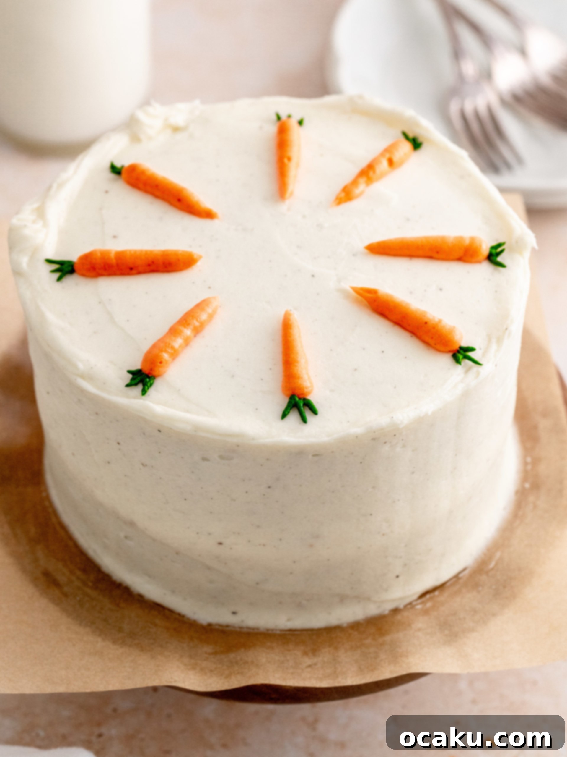 Two mini carrot cake layers cooling on a wire rack, ready for frosting.