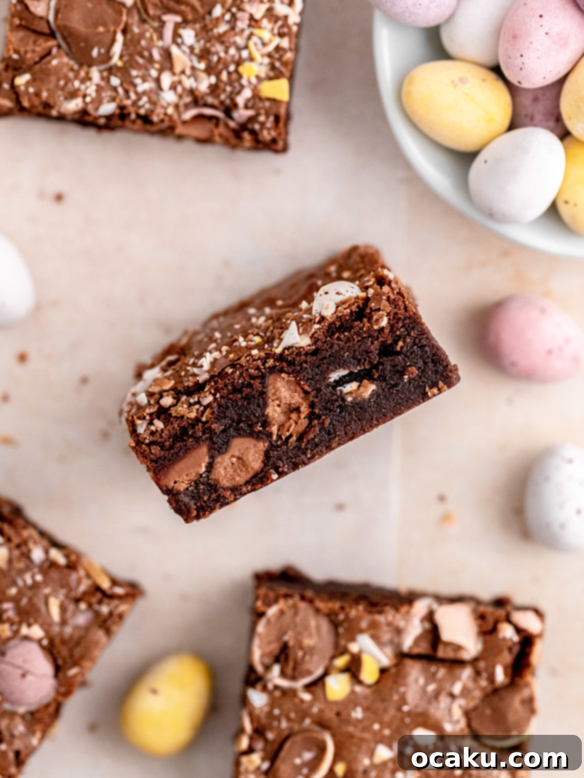 Beautifully cut Mini Egg Brownie squares, showcasing their rich interior and colorful topping, ready for serving.