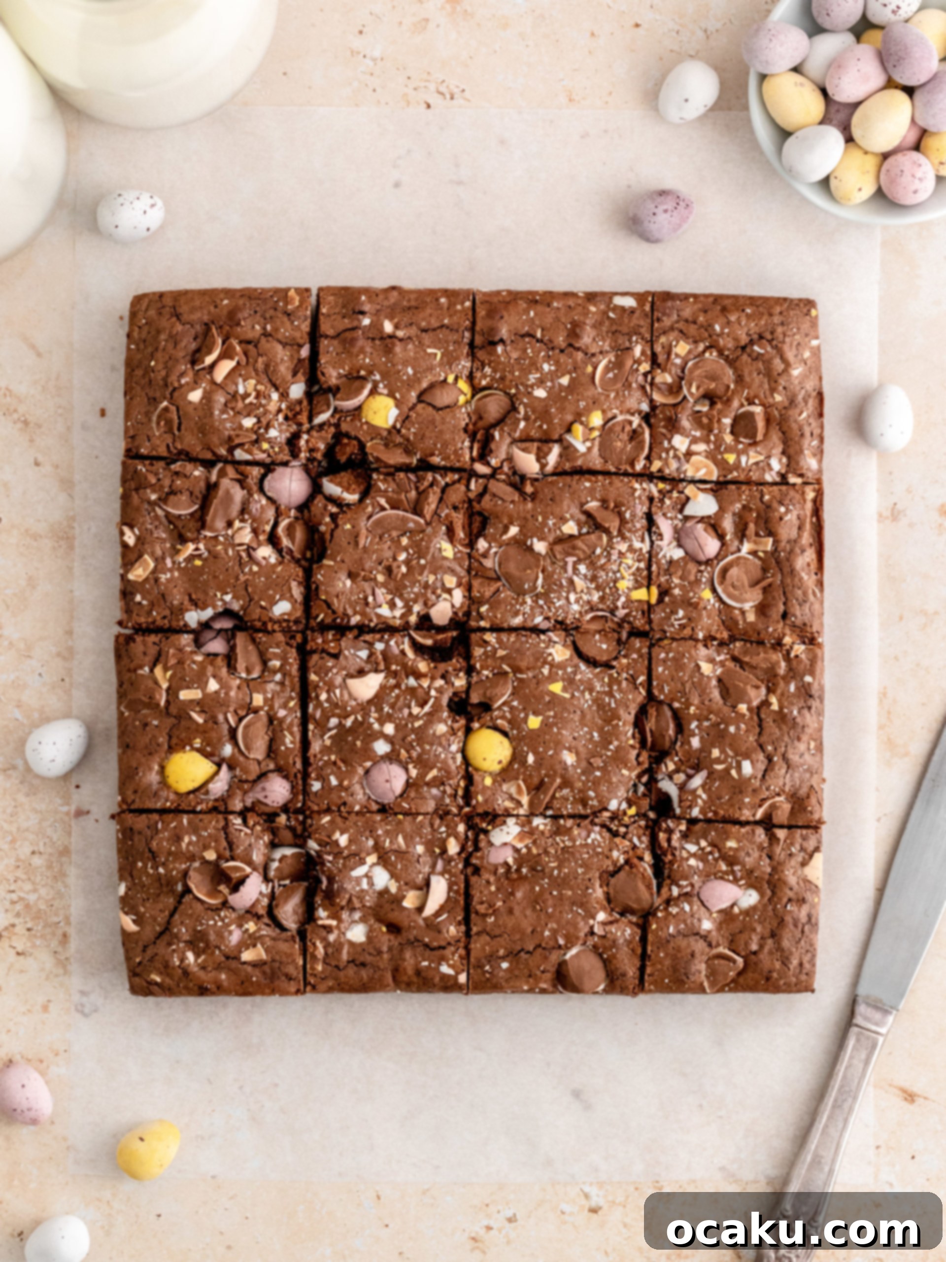 Close-up of a perfectly baked Mini Egg Brownie square, showcasing the fudgy texture and embedded mini eggs.