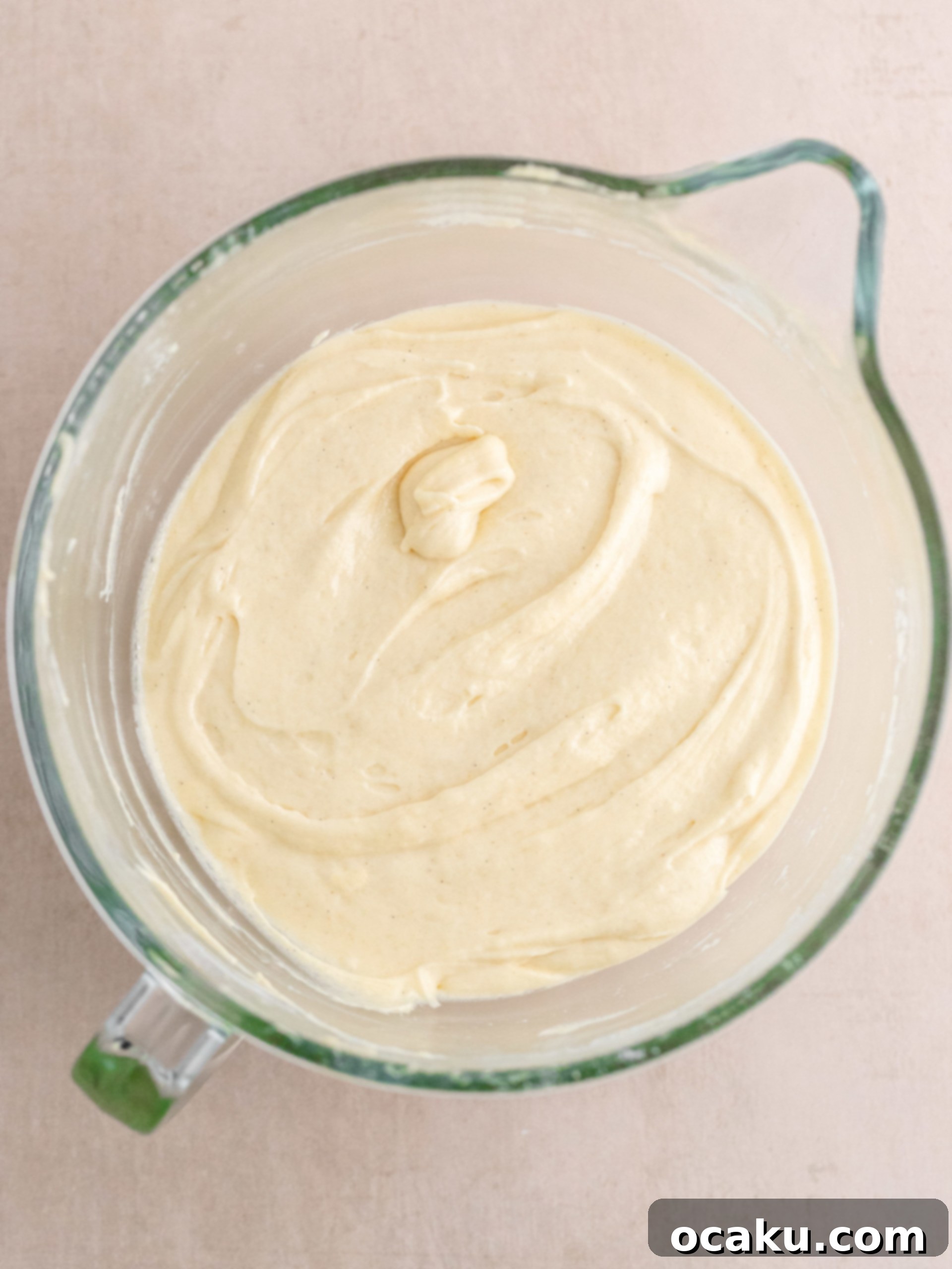 Berry Bliss Cake 6 Step 3: Mixing wet ingredients into cake batter.