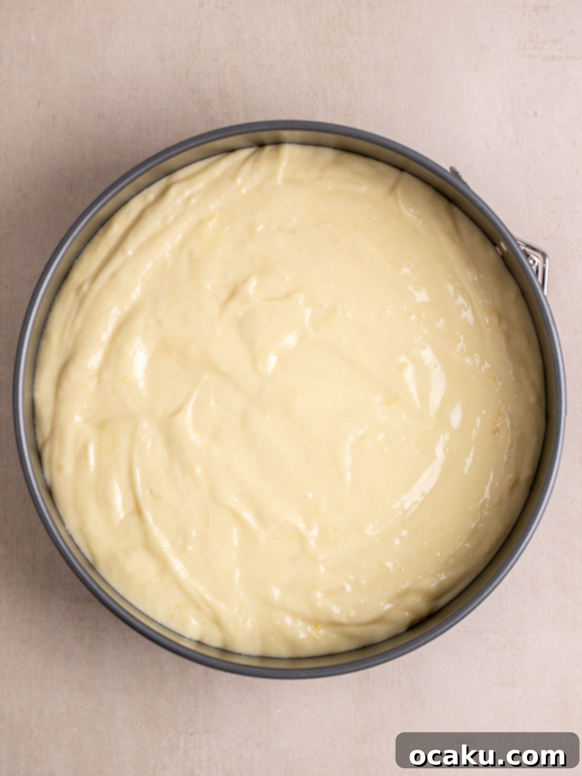 Baked lemon cake cooling on a wire rack