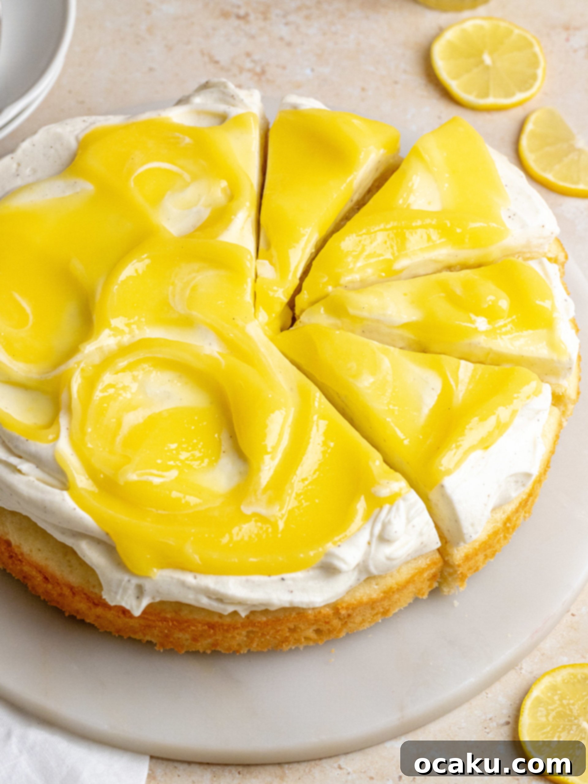 Beautifully assembled lemon curd cake on a serving plate