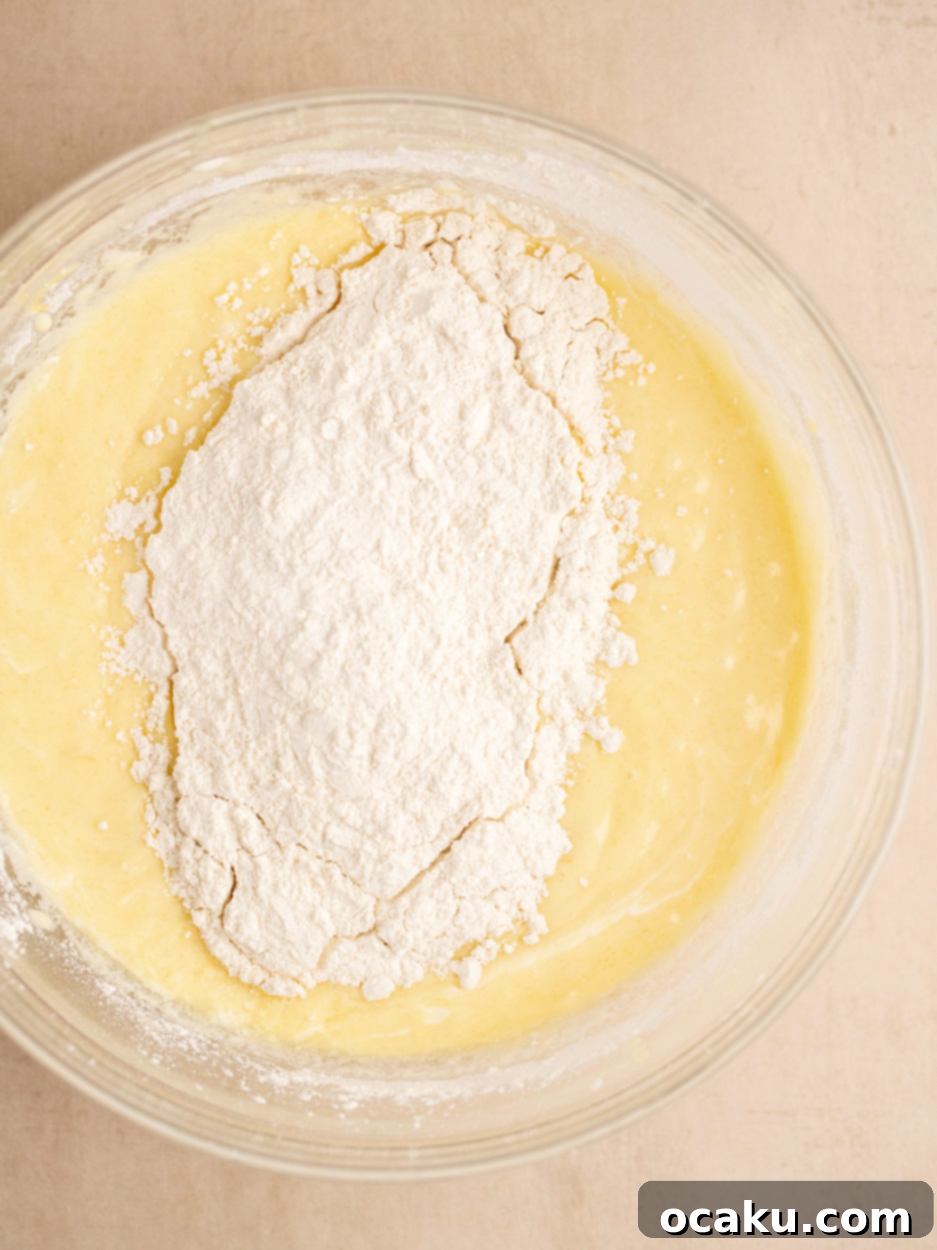 Adding sour cream and lemon juice to the cake batter