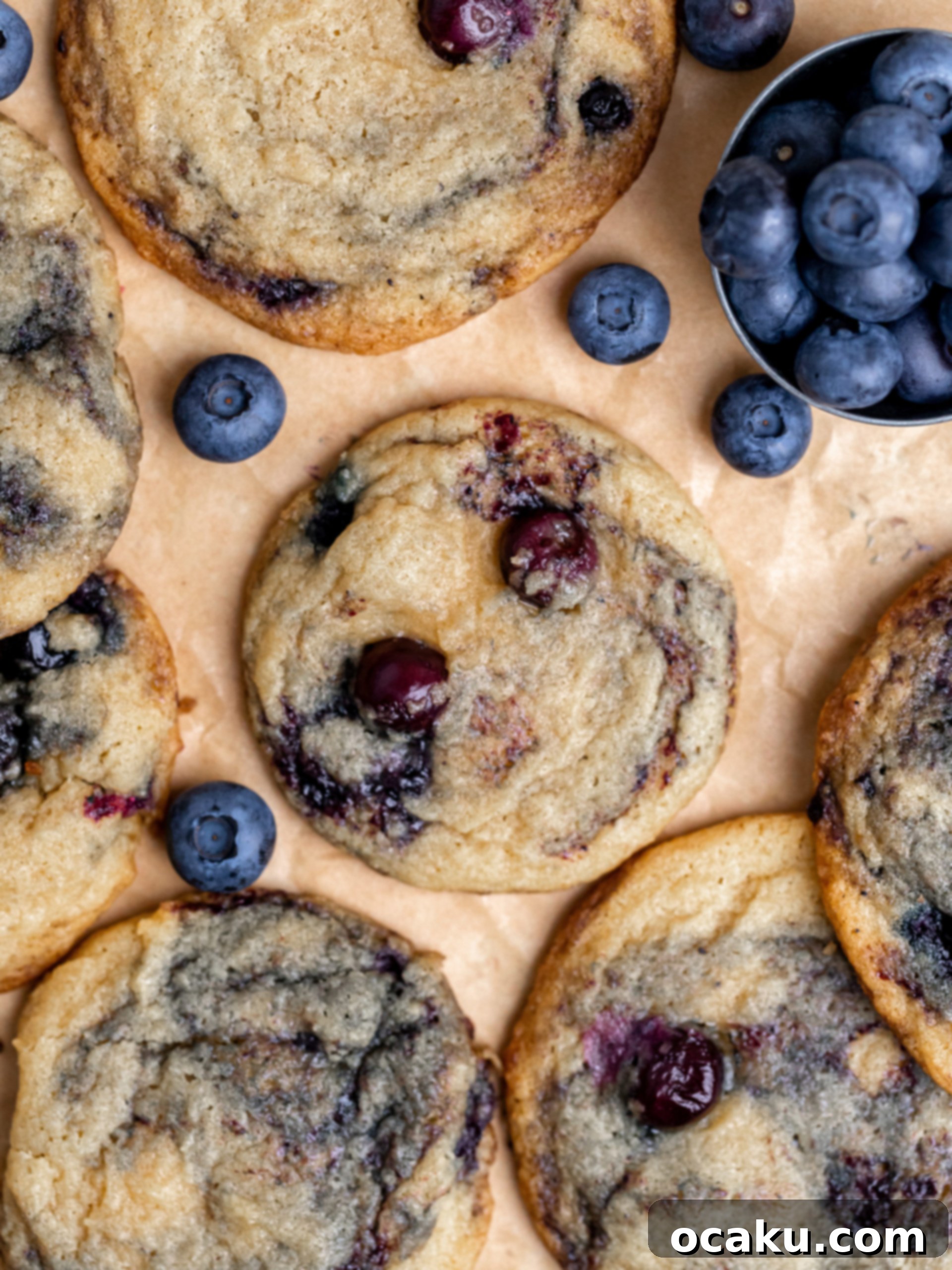 Berry Bliss Cookies 11 A stack of blueberry cookies in an airtight container for storage.