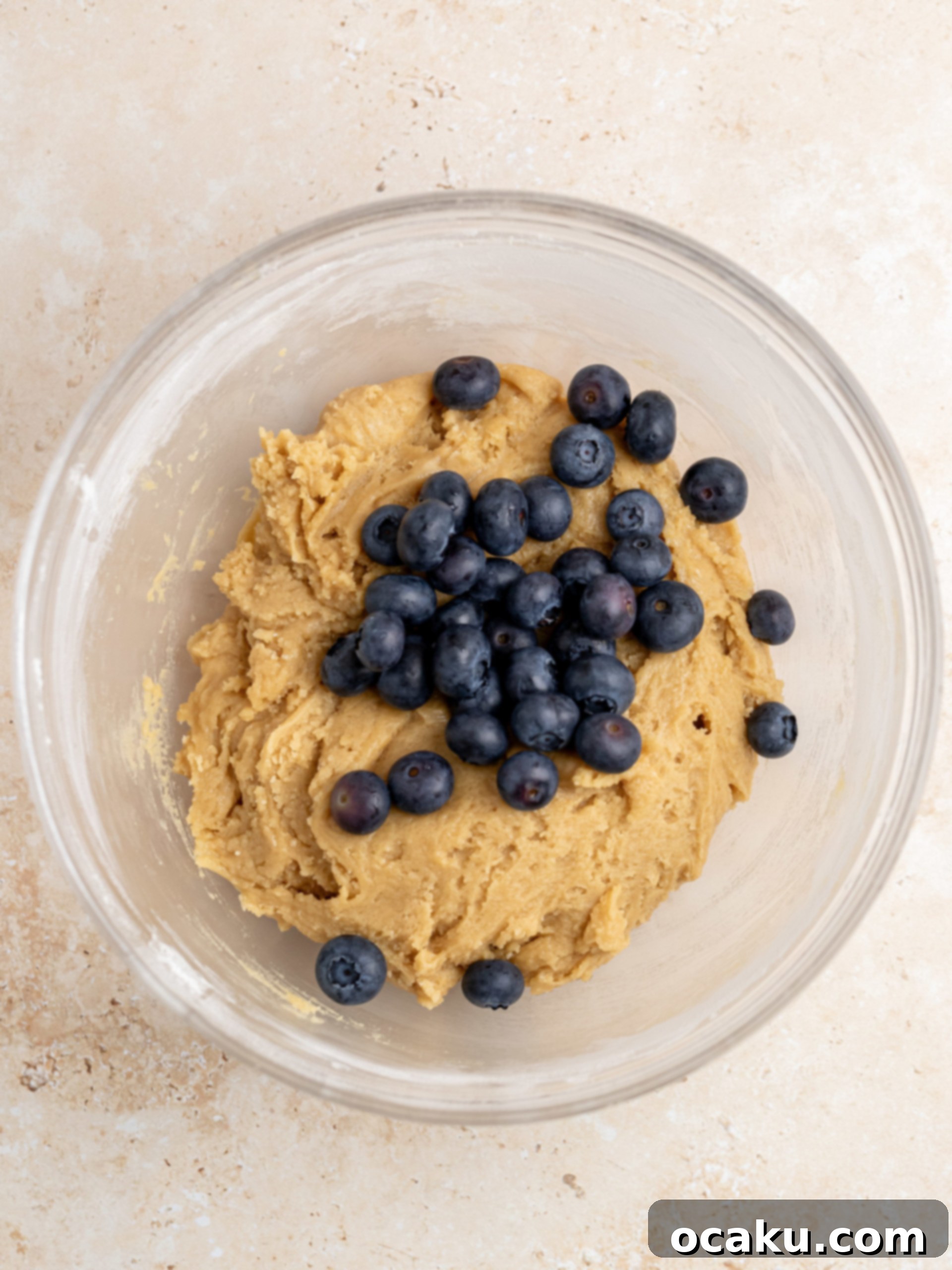 Berry Bliss Cookies 7 Swirling blueberry jam into the cookie dough with a butterknife.