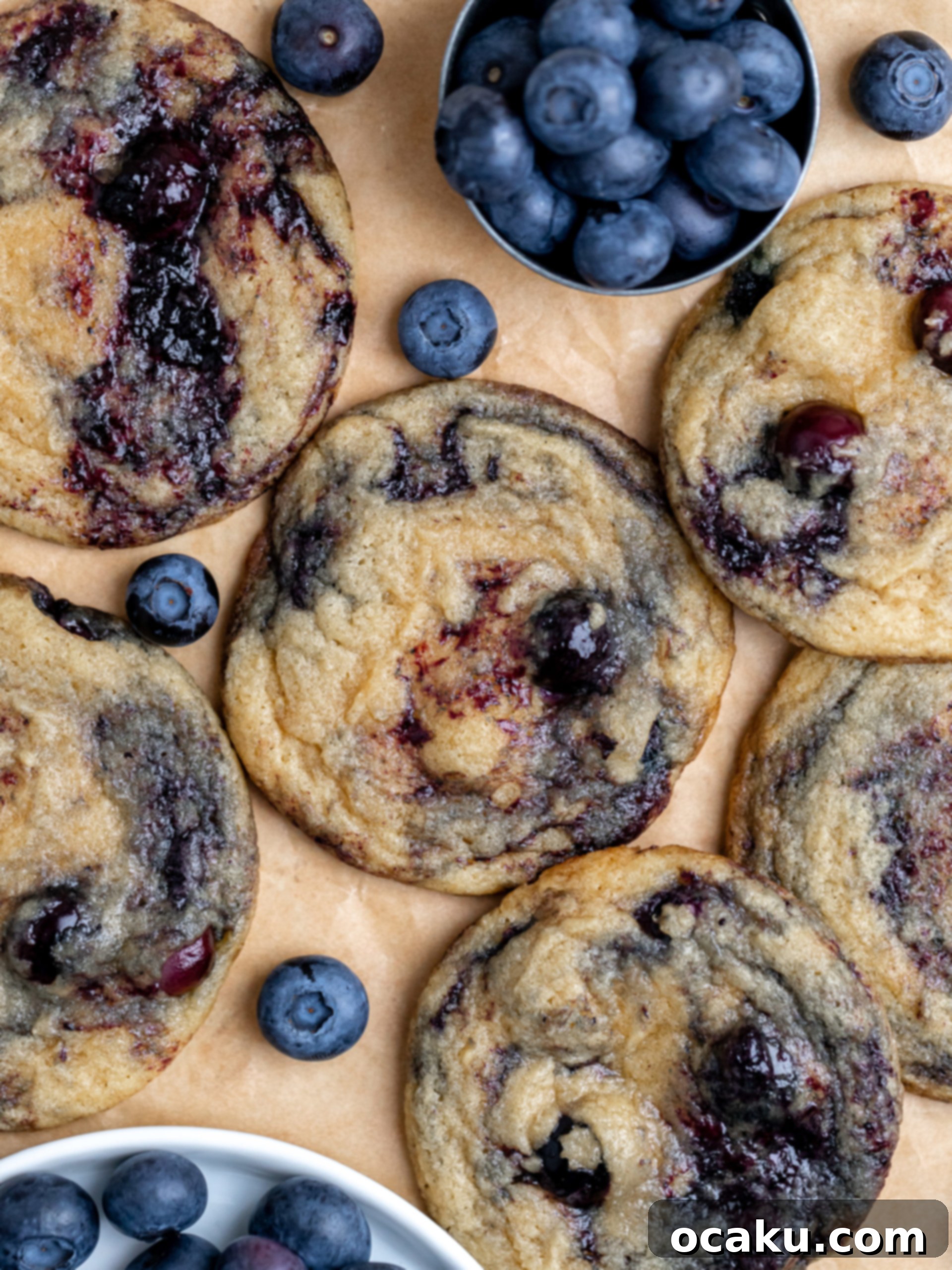 Berry Bliss Cookies 9 Freshly baked blueberry cookies cooling on a wire rack.