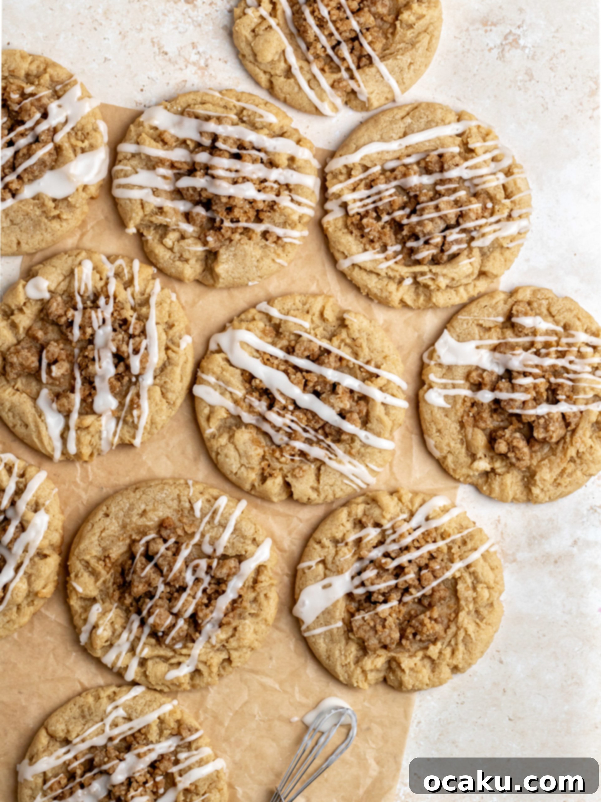Aperol Spritz Cheesecake Two Coffee Cake Cookies on a cooling rack, showcasing the streusel and glaze