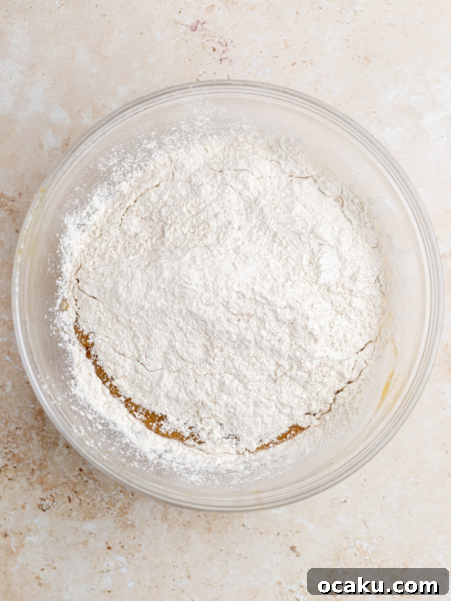 Streusel Coffee Cake Cookies 5 Egg and vanilla extract being added to butter and sugar mixture