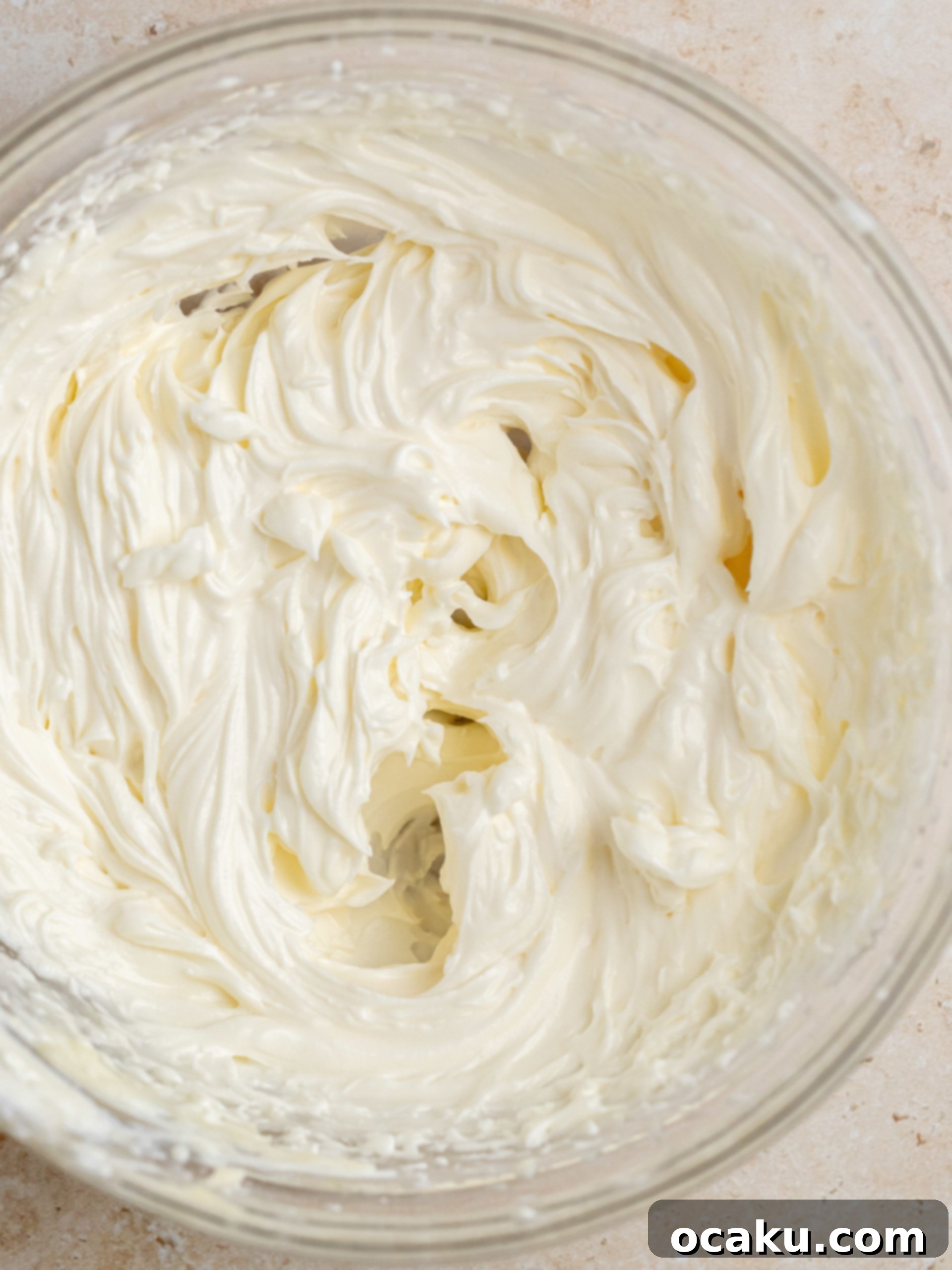 Image of dough being rolled into a log.