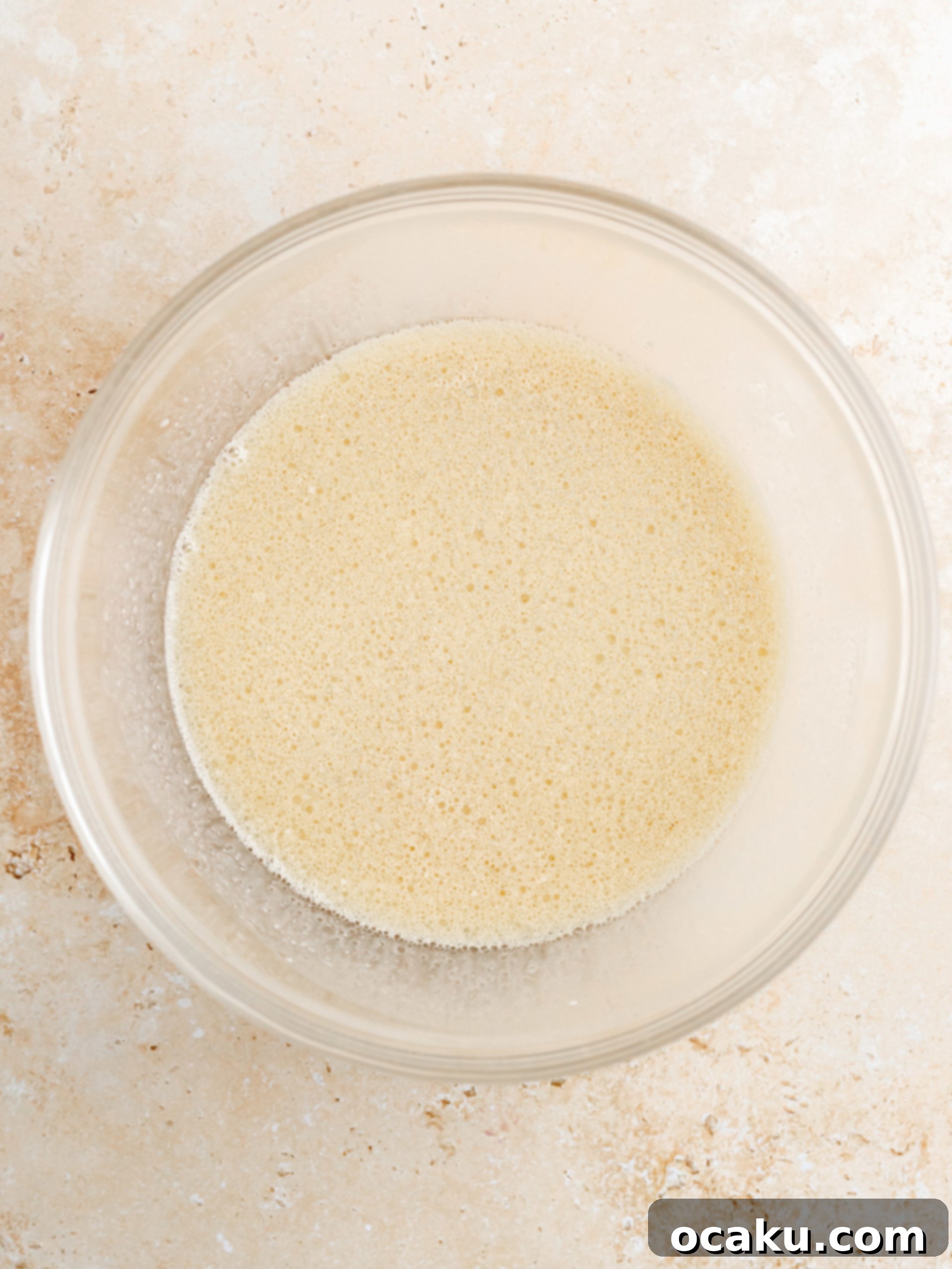 Decadent Nutella Cake 4 Dry ingredients being sifted into a bowl.