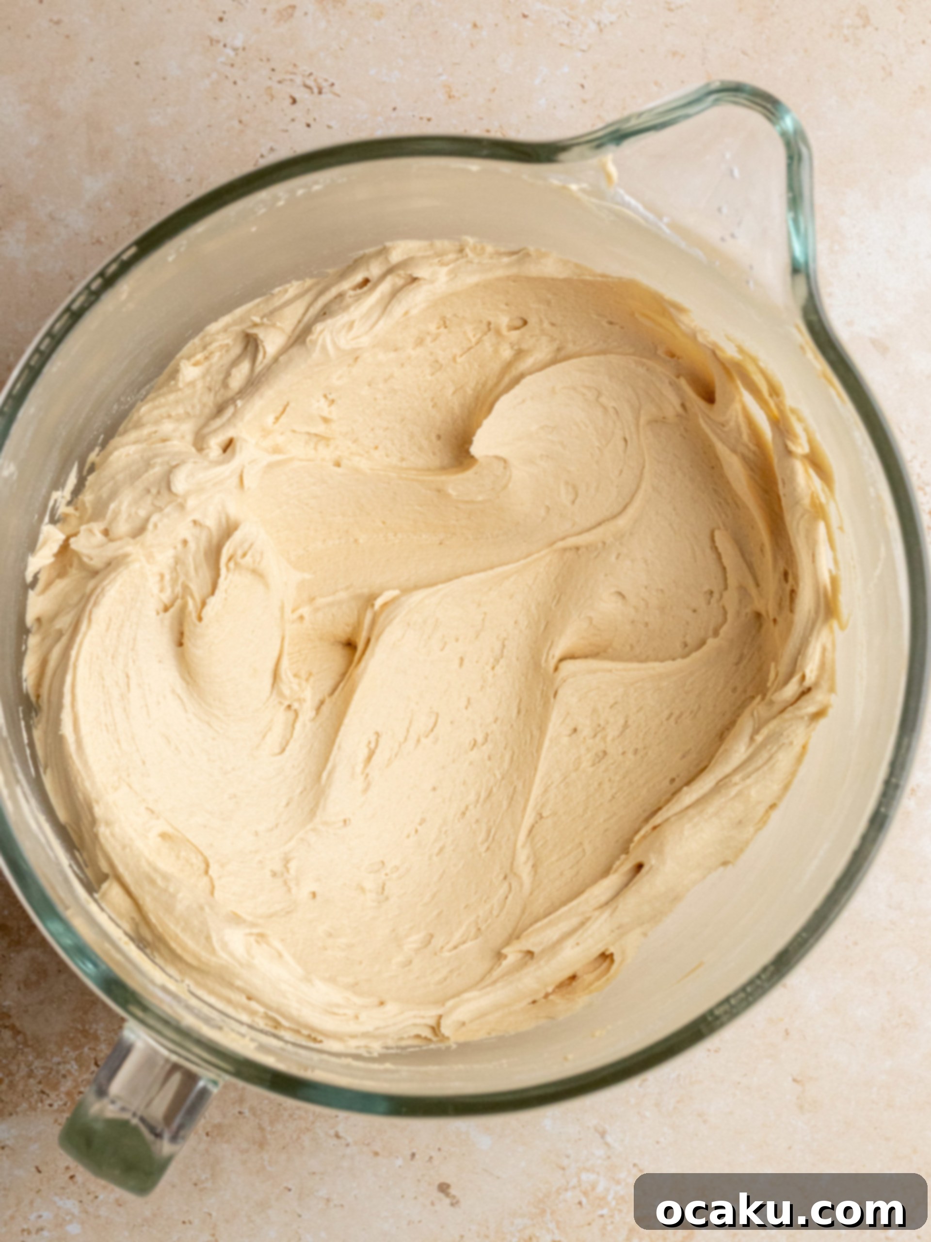Mocha Fudge Cake 6 A beautifully assembled three-layer Coffee Chocolate Cake with a smooth crumb coat of coffee buttercream.